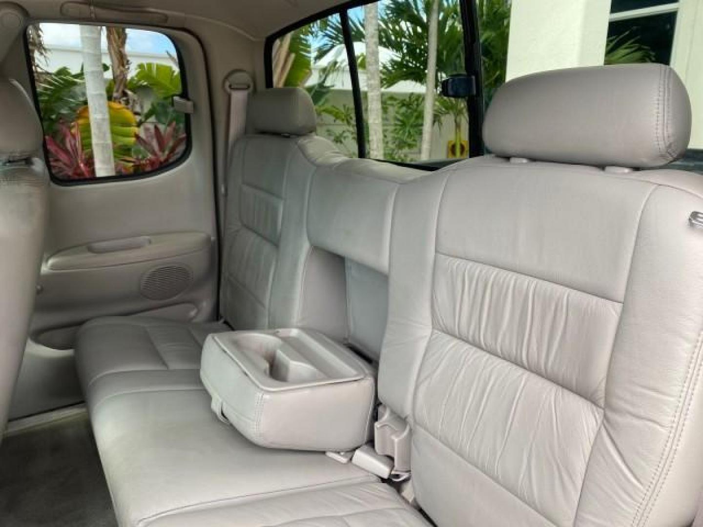 2002 Black /Oak Toyota Tundra ACCESS SR5 LEATHER LOW MILES 90,481 (5TBRN34102S) with an 3.4L DOHC EFI 24-Valve V6 Engine engine, Automatic transmission, located at 4701 North Dixie Hwy, Pompano Beach, FL, 33064, (954) 422-2889, 26.240938, -80.123474 - OUR WEBPAGE FLORIDACARS1.COM HAS OVER 100 PHOTOS AND FREE CARFAX LINK 2002 Toyota Tundra SR5 4 Door Extended Cab Pickup 3.4L V6 F DOHC 24V Gasoline 20 MPG Rear Wheel Drive Features ABS Brakes Air Conditioning Alloy Wheels AM/FM Stereo Automatic Transmission Bed Liner CD Audio Cruise Control Leather- Photo#76