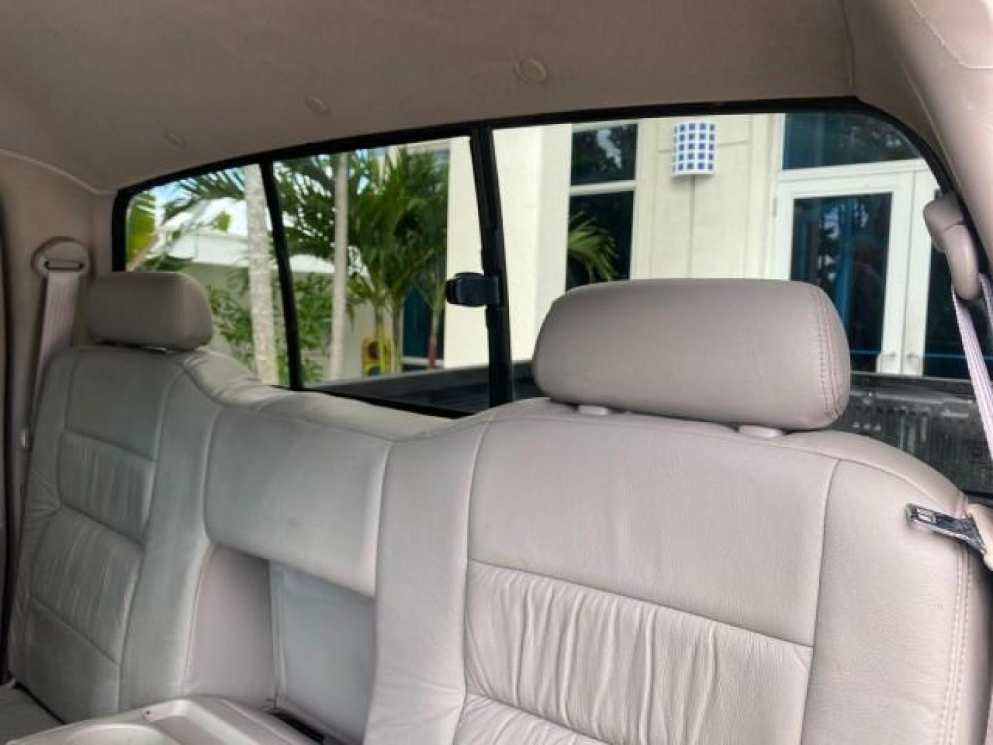 2002 Black /Oak Toyota Tundra ACCESS SR5 LEATHER LOW MILES 90,481 (5TBRN34102S) with an 3.4L DOHC EFI 24-Valve V6 Engine engine, Automatic transmission, located at 4701 North Dixie Hwy, Pompano Beach, FL, 33064, (954) 422-2889, 26.240938, -80.123474 - OUR WEBPAGE FLORIDACARS1.COM HAS OVER 100 PHOTOS AND FREE CARFAX LINK 2002 Toyota Tundra SR5 4 Door Extended Cab Pickup 3.4L V6 F DOHC 24V Gasoline 20 MPG Rear Wheel Drive Features ABS Brakes Air Conditioning Alloy Wheels AM/FM Stereo Automatic Transmission Bed Liner CD Audio Cruise Control Leather- Photo#77