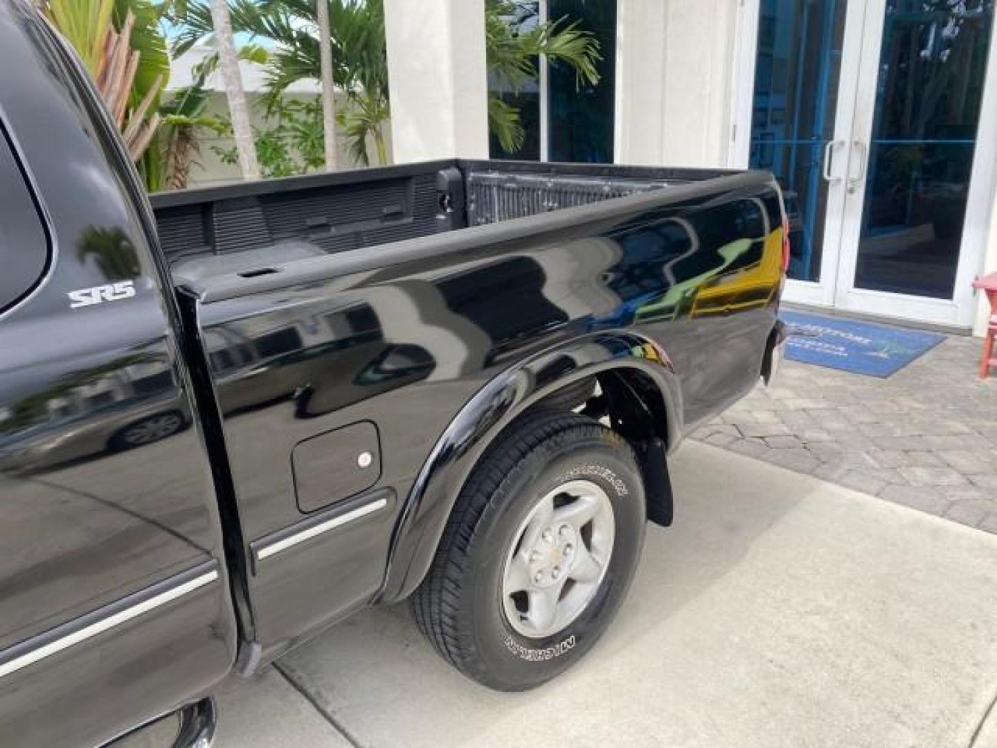 2002 Black /Oak Toyota Tundra ACCESS SR5 LEATHER LOW MILES 90,481 (5TBRN34102S) with an 3.4L DOHC EFI 24-Valve V6 Engine engine, Automatic transmission, located at 4701 North Dixie Hwy, Pompano Beach, FL, 33064, (954) 422-2889, 26.240938, -80.123474 - OUR WEBPAGE FLORIDACARS1.COM HAS OVER 100 PHOTOS AND FREE CARFAX LINK 2002 Toyota Tundra SR5 4 Door Extended Cab Pickup 3.4L V6 F DOHC 24V Gasoline 20 MPG Rear Wheel Drive Features ABS Brakes Air Conditioning Alloy Wheels AM/FM Stereo Automatic Transmission Bed Liner CD Audio Cruise Control Leather- Photo#80
