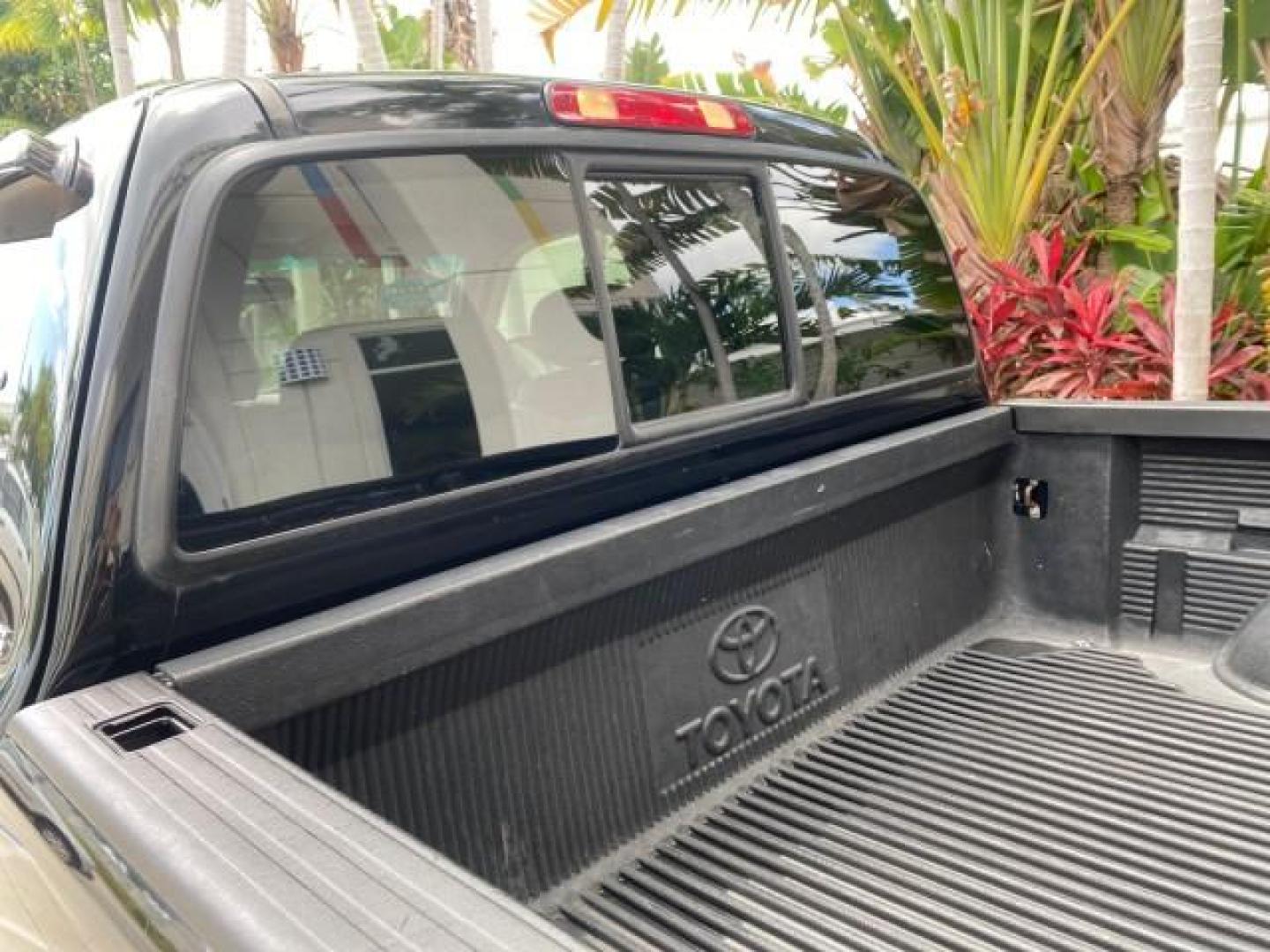 2002 Black /Oak Toyota Tundra ACCESS SR5 LEATHER LOW MILES 90,481 (5TBRN34102S) with an 3.4L DOHC EFI 24-Valve V6 Engine engine, Automatic transmission, located at 4701 North Dixie Hwy, Pompano Beach, FL, 33064, (954) 422-2889, 26.240938, -80.123474 - OUR WEBPAGE FLORIDACARS1.COM HAS OVER 100 PHOTOS AND FREE CARFAX LINK 2002 Toyota Tundra SR5 4 Door Extended Cab Pickup 3.4L V6 F DOHC 24V Gasoline 20 MPG Rear Wheel Drive Features ABS Brakes Air Conditioning Alloy Wheels AM/FM Stereo Automatic Transmission Bed Liner CD Audio Cruise Control Leather- Photo#82