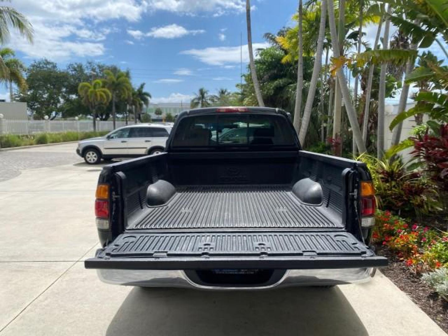 2002 Black /Oak Toyota Tundra ACCESS SR5 LEATHER LOW MILES 90,481 (5TBRN34102S) with an 3.4L DOHC EFI 24-Valve V6 Engine engine, Automatic transmission, located at 4701 North Dixie Hwy, Pompano Beach, FL, 33064, (954) 422-2889, 26.240938, -80.123474 - OUR WEBPAGE FLORIDACARS1.COM HAS OVER 100 PHOTOS AND FREE CARFAX LINK 2002 Toyota Tundra SR5 4 Door Extended Cab Pickup 3.4L V6 F DOHC 24V Gasoline 20 MPG Rear Wheel Drive Features ABS Brakes Air Conditioning Alloy Wheels AM/FM Stereo Automatic Transmission Bed Liner CD Audio Cruise Control Leather- Photo#96