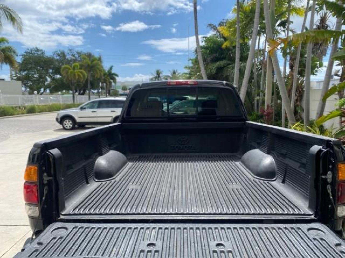 2002 Black /Oak Toyota Tundra ACCESS SR5 LEATHER LOW MILES 90,481 (5TBRN34102S) with an 3.4L DOHC EFI 24-Valve V6 Engine engine, Automatic transmission, located at 4701 North Dixie Hwy, Pompano Beach, FL, 33064, (954) 422-2889, 26.240938, -80.123474 - OUR WEBPAGE FLORIDACARS1.COM HAS OVER 100 PHOTOS AND FREE CARFAX LINK 2002 Toyota Tundra SR5 4 Door Extended Cab Pickup 3.4L V6 F DOHC 24V Gasoline 20 MPG Rear Wheel Drive Features ABS Brakes Air Conditioning Alloy Wheels AM/FM Stereo Automatic Transmission Bed Liner CD Audio Cruise Control Leather- Photo#97