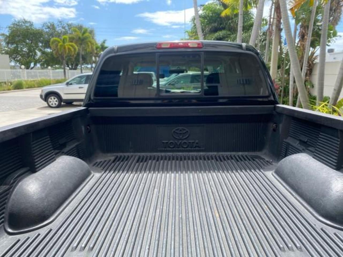 2002 Black /Oak Toyota Tundra ACCESS SR5 LEATHER LOW MILES 90,481 (5TBRN34102S) with an 3.4L DOHC EFI 24-Valve V6 Engine engine, Automatic transmission, located at 4701 North Dixie Hwy, Pompano Beach, FL, 33064, (954) 422-2889, 26.240938, -80.123474 - OUR WEBPAGE FLORIDACARS1.COM HAS OVER 100 PHOTOS AND FREE CARFAX LINK 2002 Toyota Tundra SR5 4 Door Extended Cab Pickup 3.4L V6 F DOHC 24V Gasoline 20 MPG Rear Wheel Drive Features ABS Brakes Air Conditioning Alloy Wheels AM/FM Stereo Automatic Transmission Bed Liner CD Audio Cruise Control Leather- Photo#99