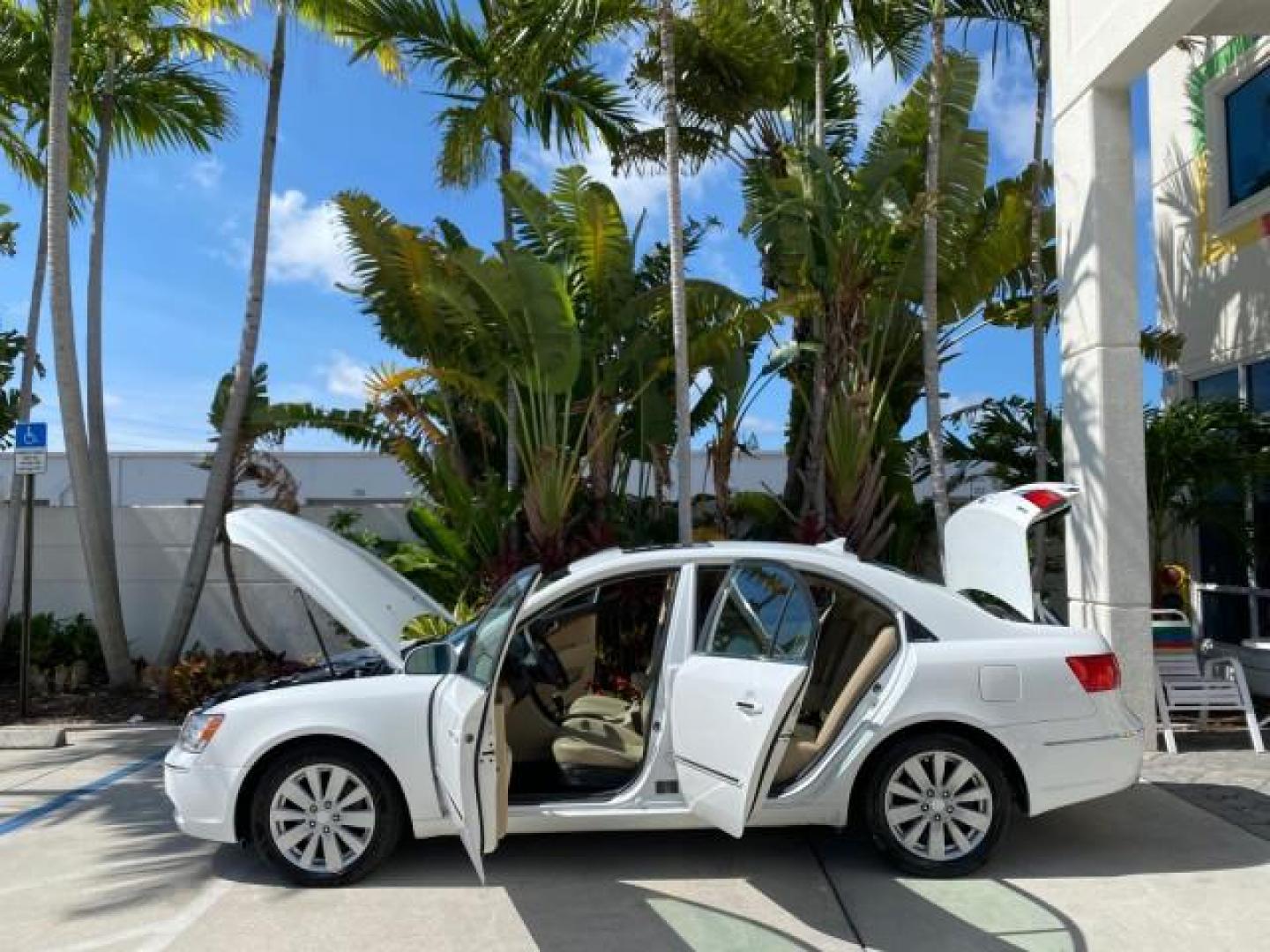 2009 Pearl White /Camel Hyundai Sonata SUNROOF Limited LOW MILES 45,849 (5NPEU46F69H) with an 3.3L DOHC V6 Engine engine, Automatic transmission, located at 4701 North Dixie Hwy, Pompano Beach, FL, 33064, (954) 422-2889, 26.240938, -80.123474 - OUR WEBPAGE FLORIDACARS1.COM HAS OVER 100 PHOTOS AND FREE CARFAX LINK 2009 Hyundai Sonata Limited V6 Sedan 4 DR 3.3L V6 F DOHC 24V Gasoline 19 MPG Front Wheel Drive Features ABS Brakes Air Conditioning Alloy Wheels AM/FM Stereo Automatic Transmission Auxiliary Audio Input CD Audio Cruise Control Fro- Photo#8