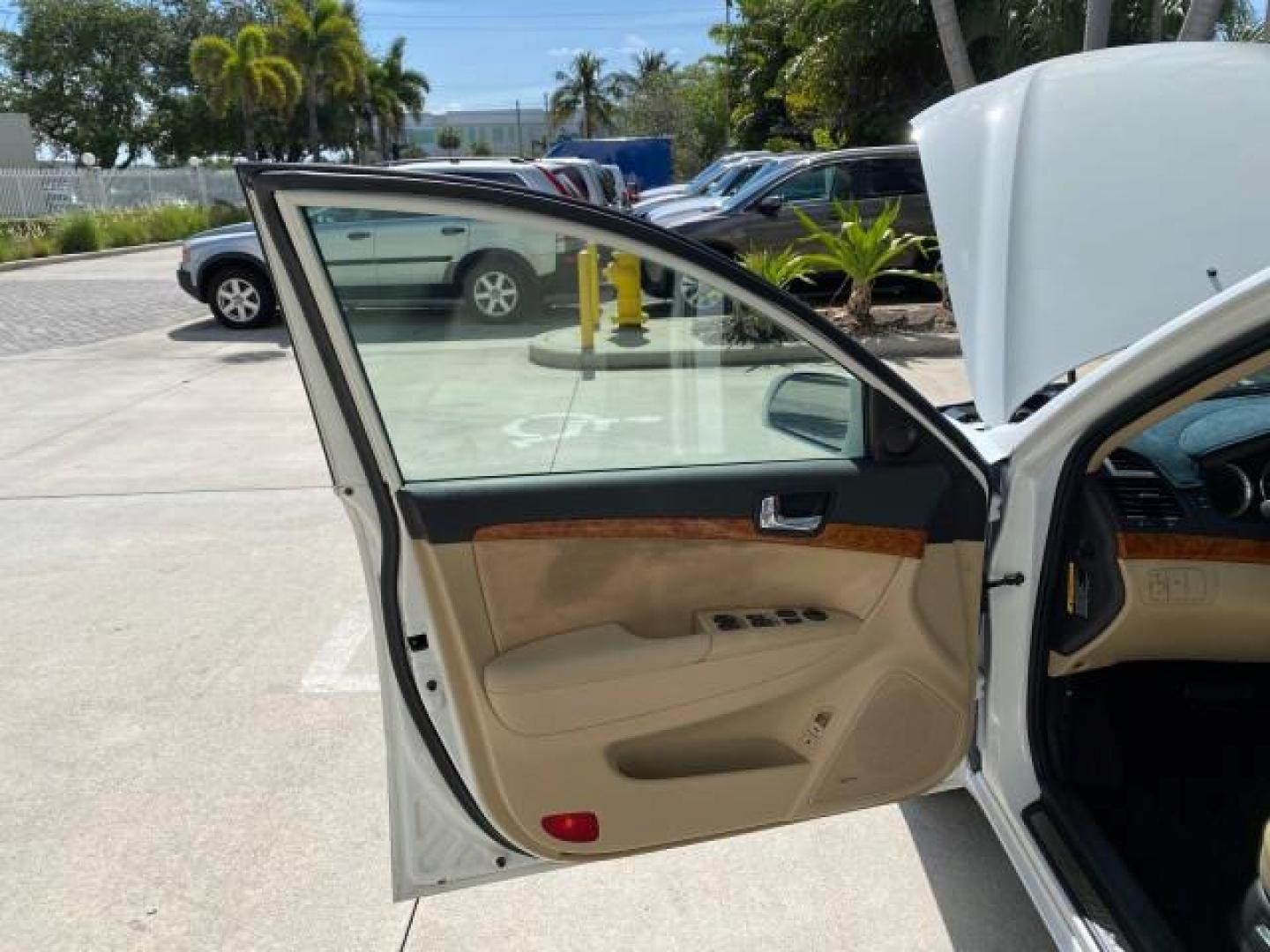 2009 Pearl White /Camel Hyundai Sonata SUNROOF Limited LOW MILES 45,849 (5NPEU46F69H) with an 3.3L DOHC V6 Engine engine, Automatic transmission, located at 4701 North Dixie Hwy, Pompano Beach, FL, 33064, (954) 422-2889, 26.240938, -80.123474 - OUR WEBPAGE FLORIDACARS1.COM HAS OVER 100 PHOTOS AND FREE CARFAX LINK 2009 Hyundai Sonata Limited V6 Sedan 4 DR 3.3L V6 F DOHC 24V Gasoline 19 MPG Front Wheel Drive Features ABS Brakes Air Conditioning Alloy Wheels AM/FM Stereo Automatic Transmission Auxiliary Audio Input CD Audio Cruise Control Fro- Photo#9