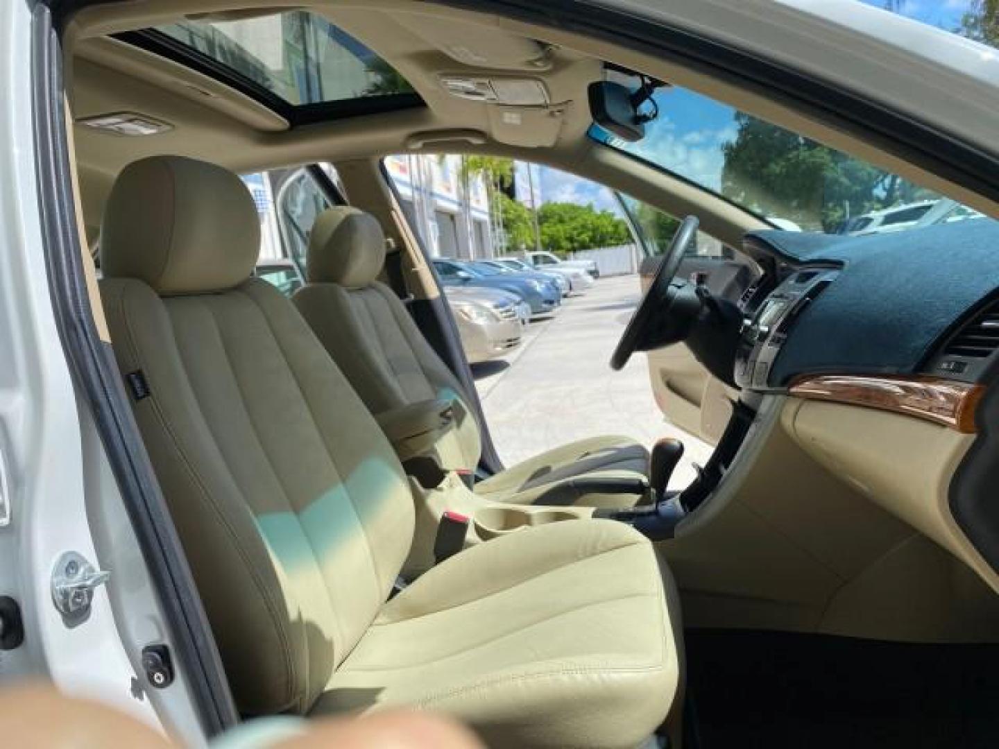 2009 Pearl White /Camel Hyundai Sonata SUNROOF Limited LOW MILES 45,849 (5NPEU46F69H) with an 3.3L DOHC V6 Engine engine, Automatic transmission, located at 4701 North Dixie Hwy, Pompano Beach, FL, 33064, (954) 422-2889, 26.240938, -80.123474 - OUR WEBPAGE FLORIDACARS1.COM HAS OVER 100 PHOTOS AND FREE CARFAX LINK 2009 Hyundai Sonata Limited V6 Sedan 4 DR 3.3L V6 F DOHC 24V Gasoline 19 MPG Front Wheel Drive Features ABS Brakes Air Conditioning Alloy Wheels AM/FM Stereo Automatic Transmission Auxiliary Audio Input CD Audio Cruise Control Fro- Photo#12