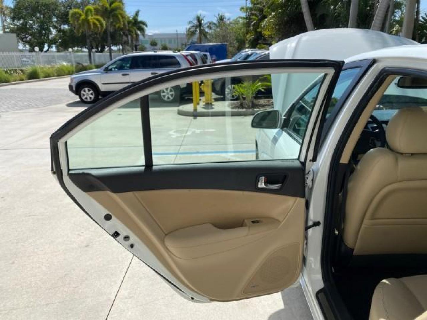 2009 Pearl White /Camel Hyundai Sonata SUNROOF Limited LOW MILES 45,849 (5NPEU46F69H) with an 3.3L DOHC V6 Engine engine, Automatic transmission, located at 4701 North Dixie Hwy, Pompano Beach, FL, 33064, (954) 422-2889, 26.240938, -80.123474 - OUR WEBPAGE FLORIDACARS1.COM HAS OVER 100 PHOTOS AND FREE CARFAX LINK 2009 Hyundai Sonata Limited V6 Sedan 4 DR 3.3L V6 F DOHC 24V Gasoline 19 MPG Front Wheel Drive Features ABS Brakes Air Conditioning Alloy Wheels AM/FM Stereo Automatic Transmission Auxiliary Audio Input CD Audio Cruise Control Fro- Photo#13