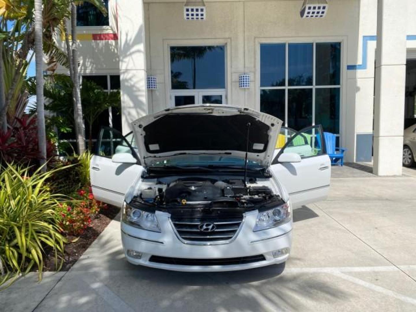 2009 Pearl White /Camel Hyundai Sonata SUNROOF Limited LOW MILES 45,849 (5NPEU46F69H) with an 3.3L DOHC V6 Engine engine, Automatic transmission, located at 4701 North Dixie Hwy, Pompano Beach, FL, 33064, (954) 422-2889, 26.240938, -80.123474 - OUR WEBPAGE FLORIDACARS1.COM HAS OVER 100 PHOTOS AND FREE CARFAX LINK 2009 Hyundai Sonata Limited V6 Sedan 4 DR 3.3L V6 F DOHC 24V Gasoline 19 MPG Front Wheel Drive Features ABS Brakes Air Conditioning Alloy Wheels AM/FM Stereo Automatic Transmission Auxiliary Audio Input CD Audio Cruise Control Fro- Photo#16