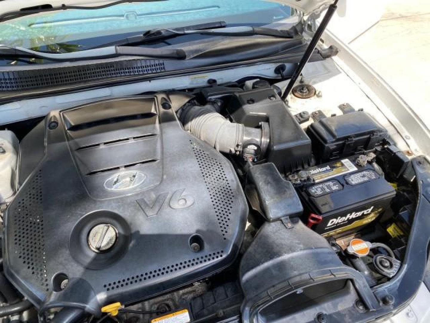 2009 Pearl White /Camel Hyundai Sonata SUNROOF Limited LOW MILES 45,849 (5NPEU46F69H) with an 3.3L DOHC V6 Engine engine, Automatic transmission, located at 4701 North Dixie Hwy, Pompano Beach, FL, 33064, (954) 422-2889, 26.240938, -80.123474 - OUR WEBPAGE FLORIDACARS1.COM HAS OVER 100 PHOTOS AND FREE CARFAX LINK 2009 Hyundai Sonata Limited V6 Sedan 4 DR 3.3L V6 F DOHC 24V Gasoline 19 MPG Front Wheel Drive Features ABS Brakes Air Conditioning Alloy Wheels AM/FM Stereo Automatic Transmission Auxiliary Audio Input CD Audio Cruise Control Fro- Photo#25