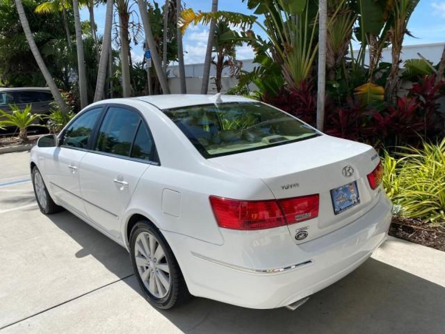 2009 Pearl White /Camel Hyundai Sonata SUNROOF Limited LOW MILES 45,849 (5NPEU46F69H) with an 3.3L DOHC V6 Engine engine, Automatic transmission, located at 4701 North Dixie Hwy, Pompano Beach, FL, 33064, (954) 422-2889, 26.240938, -80.123474 - OUR WEBPAGE FLORIDACARS1.COM HAS OVER 100 PHOTOS AND FREE CARFAX LINK 2009 Hyundai Sonata Limited V6 Sedan 4 DR 3.3L V6 F DOHC 24V Gasoline 19 MPG Front Wheel Drive Features ABS Brakes Air Conditioning Alloy Wheels AM/FM Stereo Automatic Transmission Auxiliary Audio Input CD Audio Cruise Control Fro- Photo#33