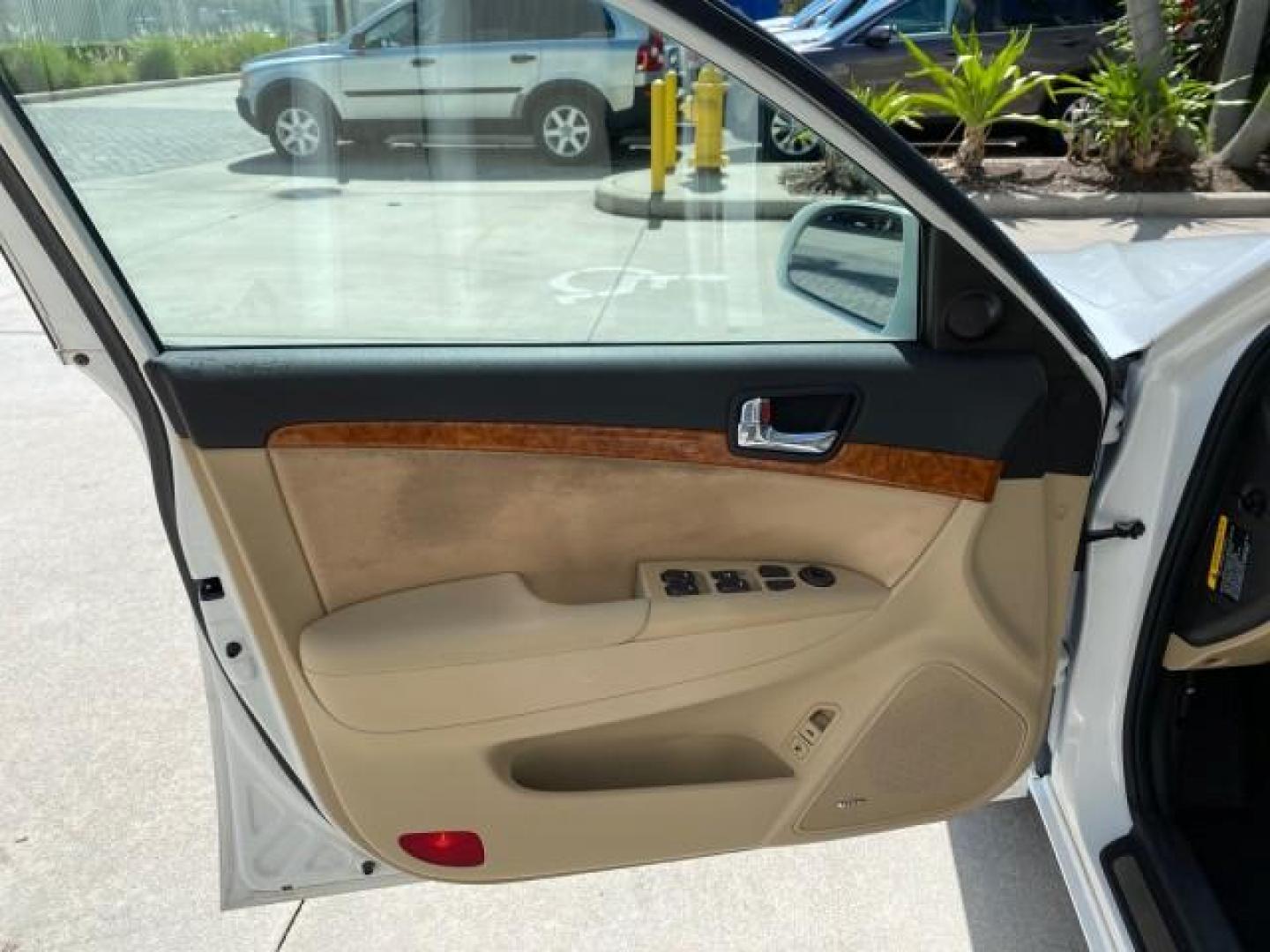 2009 Pearl White /Camel Hyundai Sonata SUNROOF Limited LOW MILES 45,849 (5NPEU46F69H) with an 3.3L DOHC V6 Engine engine, Automatic transmission, located at 4701 North Dixie Hwy, Pompano Beach, FL, 33064, (954) 422-2889, 26.240938, -80.123474 - OUR WEBPAGE FLORIDACARS1.COM HAS OVER 100 PHOTOS AND FREE CARFAX LINK 2009 Hyundai Sonata Limited V6 Sedan 4 DR 3.3L V6 F DOHC 24V Gasoline 19 MPG Front Wheel Drive Features ABS Brakes Air Conditioning Alloy Wheels AM/FM Stereo Automatic Transmission Auxiliary Audio Input CD Audio Cruise Control Fro- Photo#40