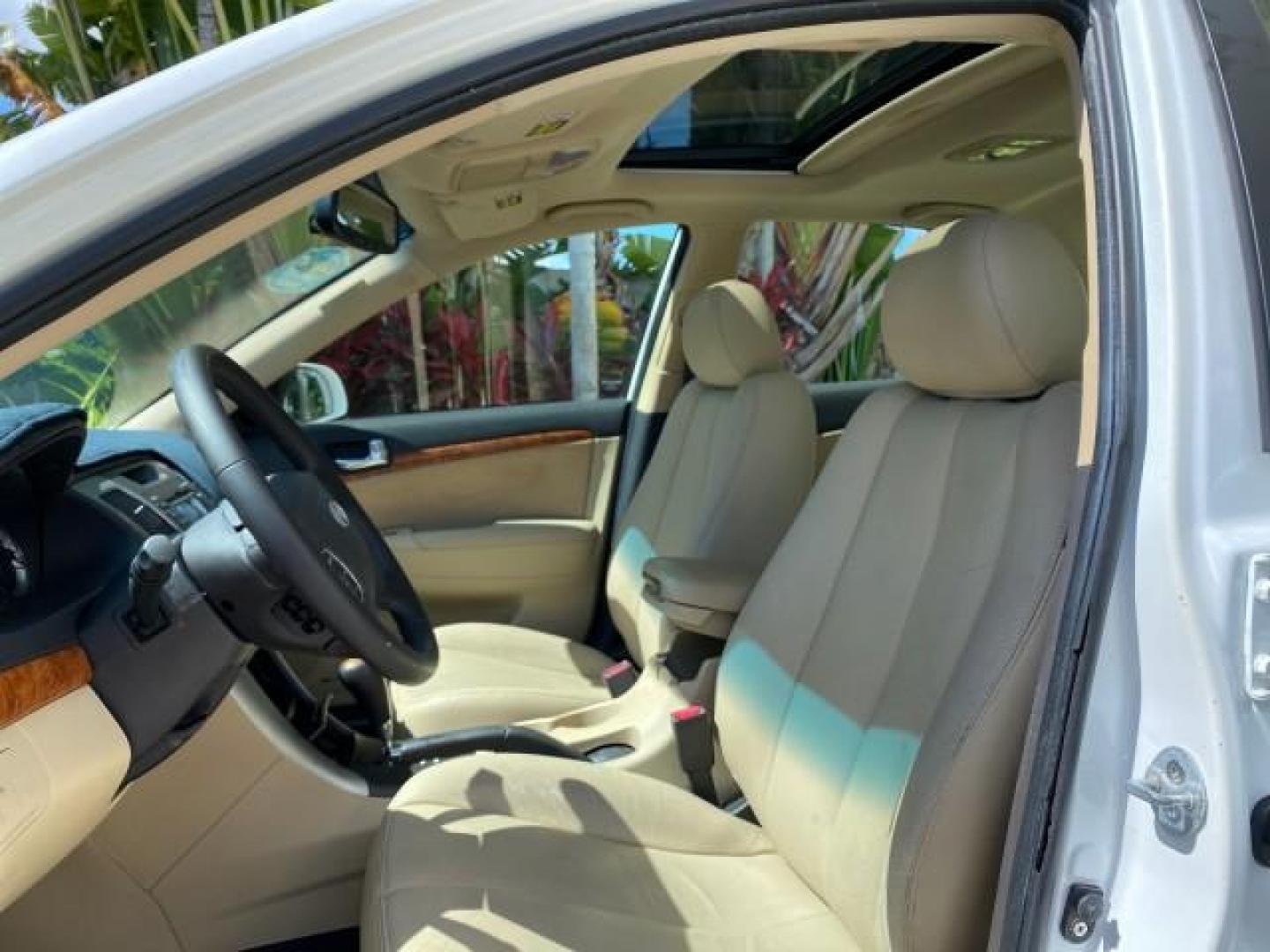 2009 Pearl White /Camel Hyundai Sonata SUNROOF Limited LOW MILES 45,849 (5NPEU46F69H) with an 3.3L DOHC V6 Engine engine, Automatic transmission, located at 4701 North Dixie Hwy, Pompano Beach, FL, 33064, (954) 422-2889, 26.240938, -80.123474 - OUR WEBPAGE FLORIDACARS1.COM HAS OVER 100 PHOTOS AND FREE CARFAX LINK 2009 Hyundai Sonata Limited V6 Sedan 4 DR 3.3L V6 F DOHC 24V Gasoline 19 MPG Front Wheel Drive Features ABS Brakes Air Conditioning Alloy Wheels AM/FM Stereo Automatic Transmission Auxiliary Audio Input CD Audio Cruise Control Fro- Photo#42