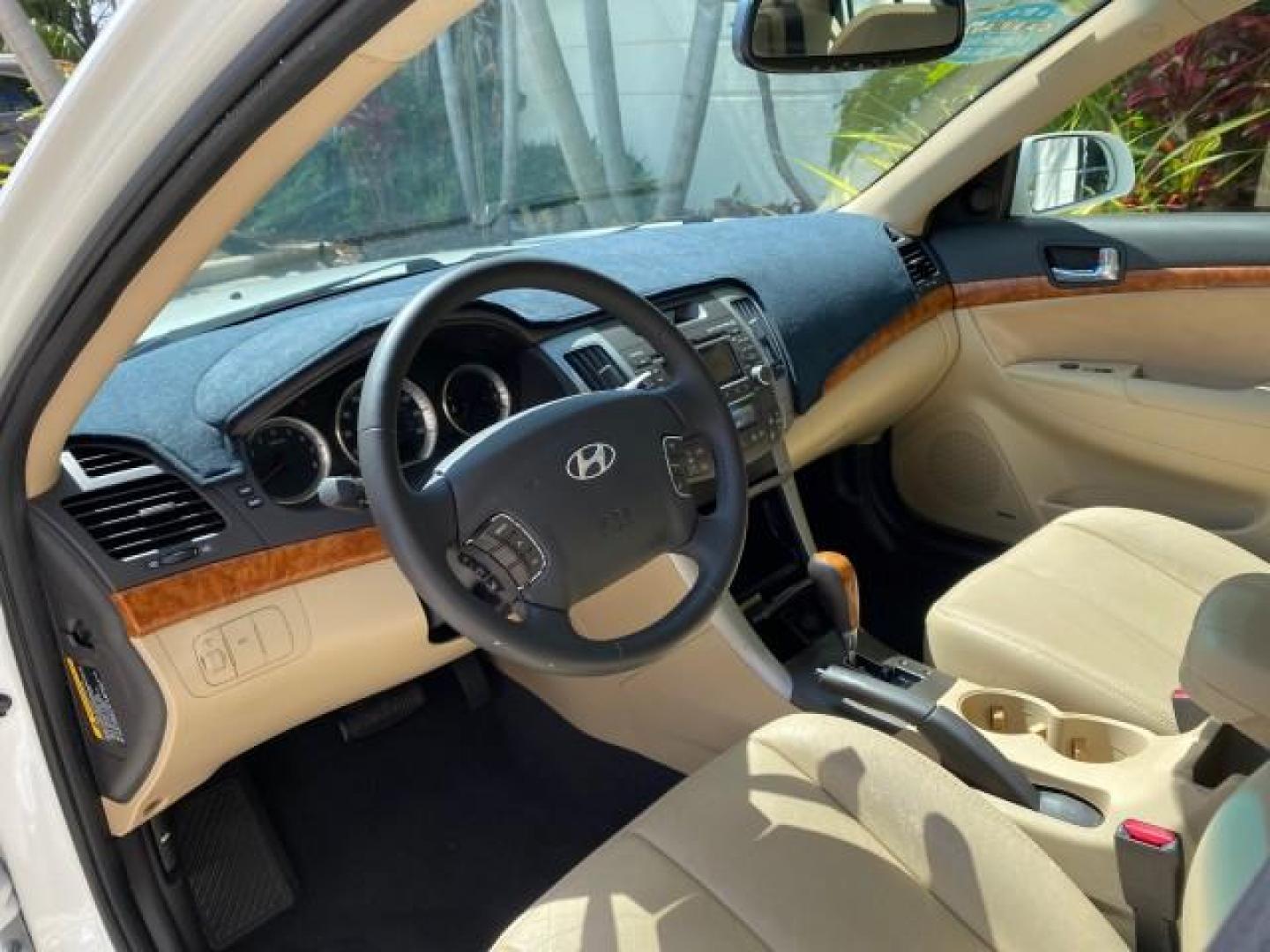 2009 Pearl White /Camel Hyundai Sonata SUNROOF Limited LOW MILES 45,849 (5NPEU46F69H) with an 3.3L DOHC V6 Engine engine, Automatic transmission, located at 4701 North Dixie Hwy, Pompano Beach, FL, 33064, (954) 422-2889, 26.240938, -80.123474 - OUR WEBPAGE FLORIDACARS1.COM HAS OVER 100 PHOTOS AND FREE CARFAX LINK 2009 Hyundai Sonata Limited V6 Sedan 4 DR 3.3L V6 F DOHC 24V Gasoline 19 MPG Front Wheel Drive Features ABS Brakes Air Conditioning Alloy Wheels AM/FM Stereo Automatic Transmission Auxiliary Audio Input CD Audio Cruise Control Fro- Photo#47