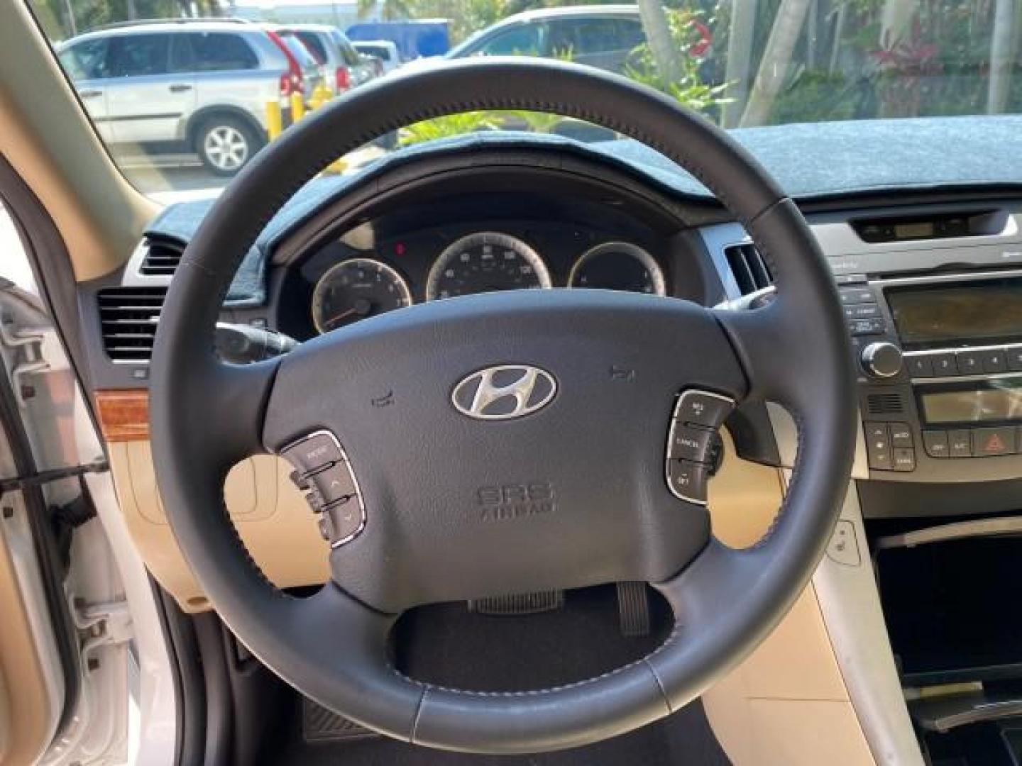 2009 Pearl White /Camel Hyundai Sonata SUNROOF Limited LOW MILES 45,849 (5NPEU46F69H) with an 3.3L DOHC V6 Engine engine, Automatic transmission, located at 4701 North Dixie Hwy, Pompano Beach, FL, 33064, (954) 422-2889, 26.240938, -80.123474 - OUR WEBPAGE FLORIDACARS1.COM HAS OVER 100 PHOTOS AND FREE CARFAX LINK 2009 Hyundai Sonata Limited V6 Sedan 4 DR 3.3L V6 F DOHC 24V Gasoline 19 MPG Front Wheel Drive Features ABS Brakes Air Conditioning Alloy Wheels AM/FM Stereo Automatic Transmission Auxiliary Audio Input CD Audio Cruise Control Fro- Photo#48