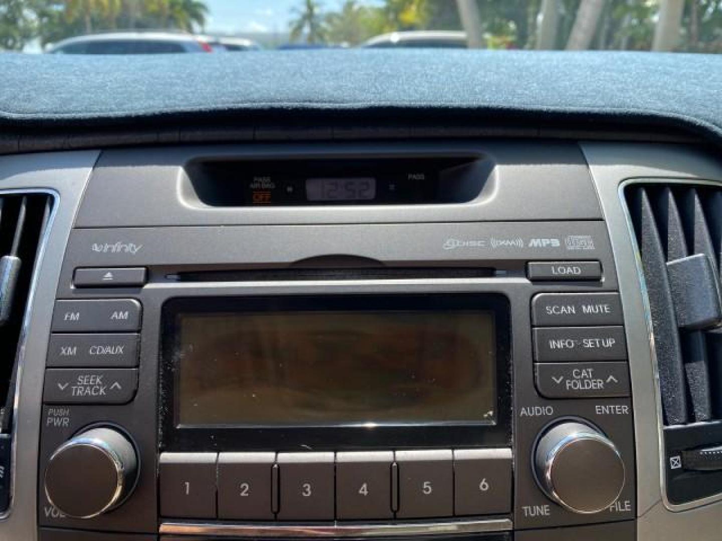 2009 Pearl White /Camel Hyundai Sonata SUNROOF Limited LOW MILES 45,849 (5NPEU46F69H) with an 3.3L DOHC V6 Engine engine, Automatic transmission, located at 4701 North Dixie Hwy, Pompano Beach, FL, 33064, (954) 422-2889, 26.240938, -80.123474 - OUR WEBPAGE FLORIDACARS1.COM HAS OVER 100 PHOTOS AND FREE CARFAX LINK 2009 Hyundai Sonata Limited V6 Sedan 4 DR 3.3L V6 F DOHC 24V Gasoline 19 MPG Front Wheel Drive Features ABS Brakes Air Conditioning Alloy Wheels AM/FM Stereo Automatic Transmission Auxiliary Audio Input CD Audio Cruise Control Fro- Photo#58
