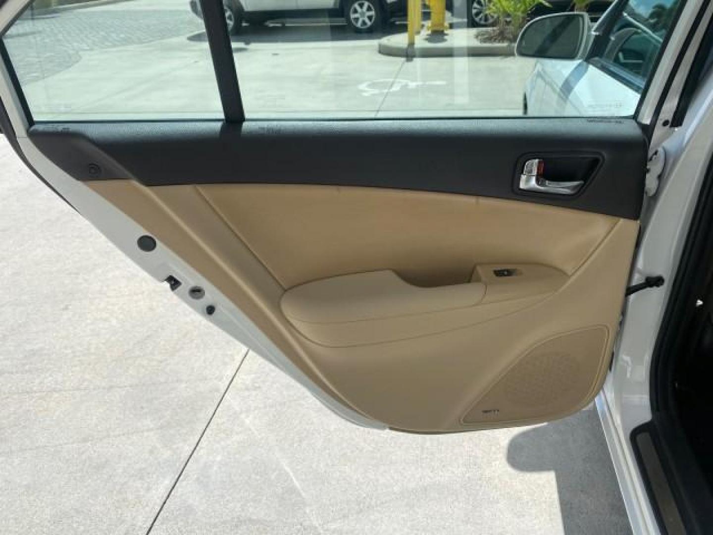 2009 Pearl White /Camel Hyundai Sonata SUNROOF Limited LOW MILES 45,849 (5NPEU46F69H) with an 3.3L DOHC V6 Engine engine, Automatic transmission, located at 4701 North Dixie Hwy, Pompano Beach, FL, 33064, (954) 422-2889, 26.240938, -80.123474 - OUR WEBPAGE FLORIDACARS1.COM HAS OVER 100 PHOTOS AND FREE CARFAX LINK 2009 Hyundai Sonata Limited V6 Sedan 4 DR 3.3L V6 F DOHC 24V Gasoline 19 MPG Front Wheel Drive Features ABS Brakes Air Conditioning Alloy Wheels AM/FM Stereo Automatic Transmission Auxiliary Audio Input CD Audio Cruise Control Fro- Photo#78