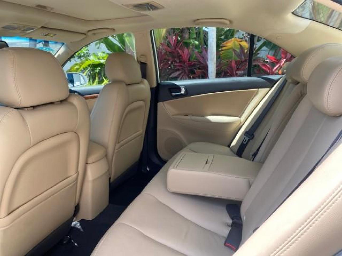 2009 Pearl White /Camel Hyundai Sonata SUNROOF Limited LOW MILES 45,849 (5NPEU46F69H) with an 3.3L DOHC V6 Engine engine, Automatic transmission, located at 4701 North Dixie Hwy, Pompano Beach, FL, 33064, (954) 422-2889, 26.240938, -80.123474 - OUR WEBPAGE FLORIDACARS1.COM HAS OVER 100 PHOTOS AND FREE CARFAX LINK 2009 Hyundai Sonata Limited V6 Sedan 4 DR 3.3L V6 F DOHC 24V Gasoline 19 MPG Front Wheel Drive Features ABS Brakes Air Conditioning Alloy Wheels AM/FM Stereo Automatic Transmission Auxiliary Audio Input CD Audio Cruise Control Fro- Photo#81
