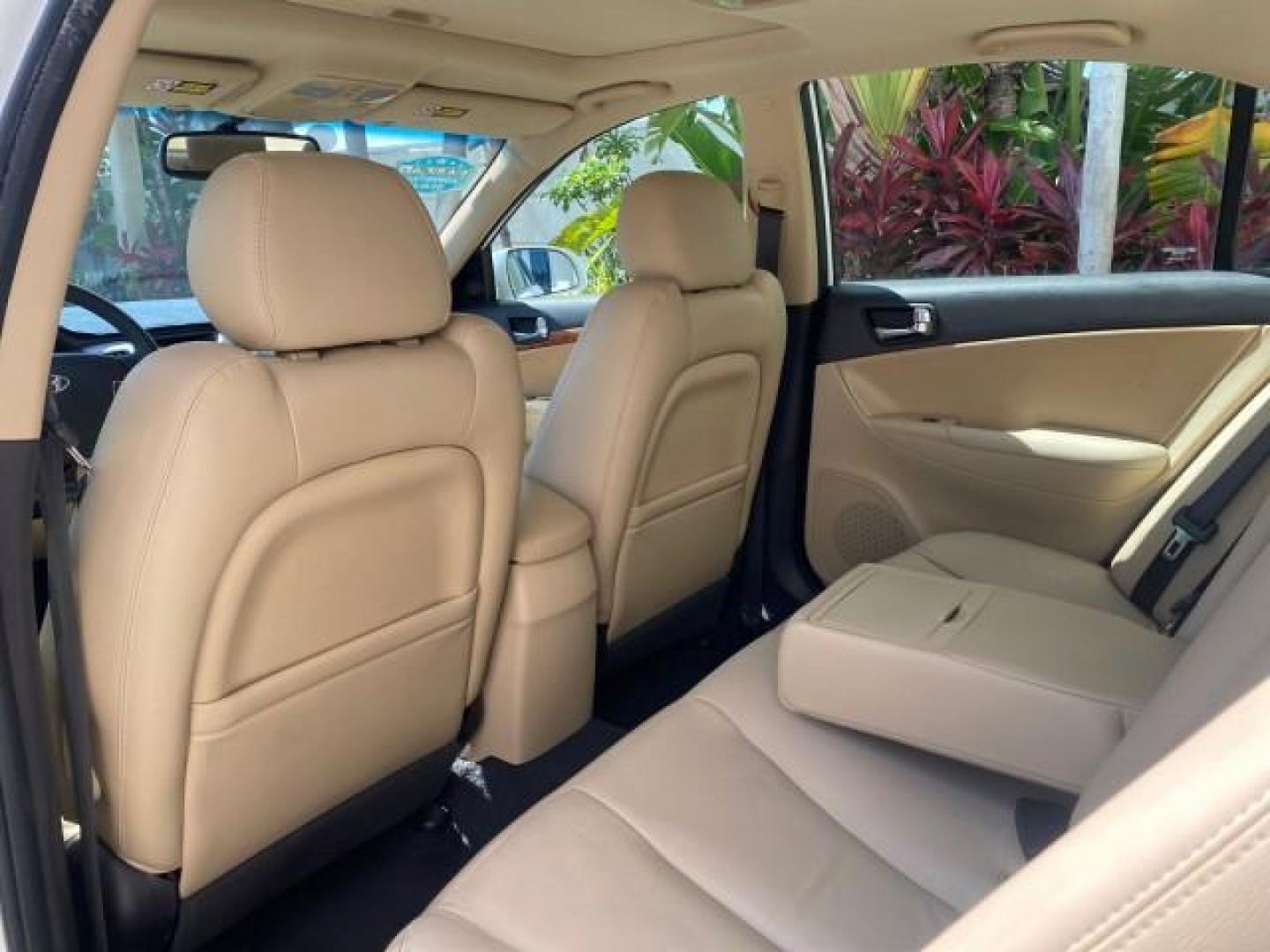 2009 Pearl White /Camel Hyundai Sonata SUNROOF Limited LOW MILES 45,849 (5NPEU46F69H) with an 3.3L DOHC V6 Engine engine, Automatic transmission, located at 4701 North Dixie Hwy, Pompano Beach, FL, 33064, (954) 422-2889, 26.240938, -80.123474 - OUR WEBPAGE FLORIDACARS1.COM HAS OVER 100 PHOTOS AND FREE CARFAX LINK 2009 Hyundai Sonata Limited V6 Sedan 4 DR 3.3L V6 F DOHC 24V Gasoline 19 MPG Front Wheel Drive Features ABS Brakes Air Conditioning Alloy Wheels AM/FM Stereo Automatic Transmission Auxiliary Audio Input CD Audio Cruise Control Fro- Photo#82