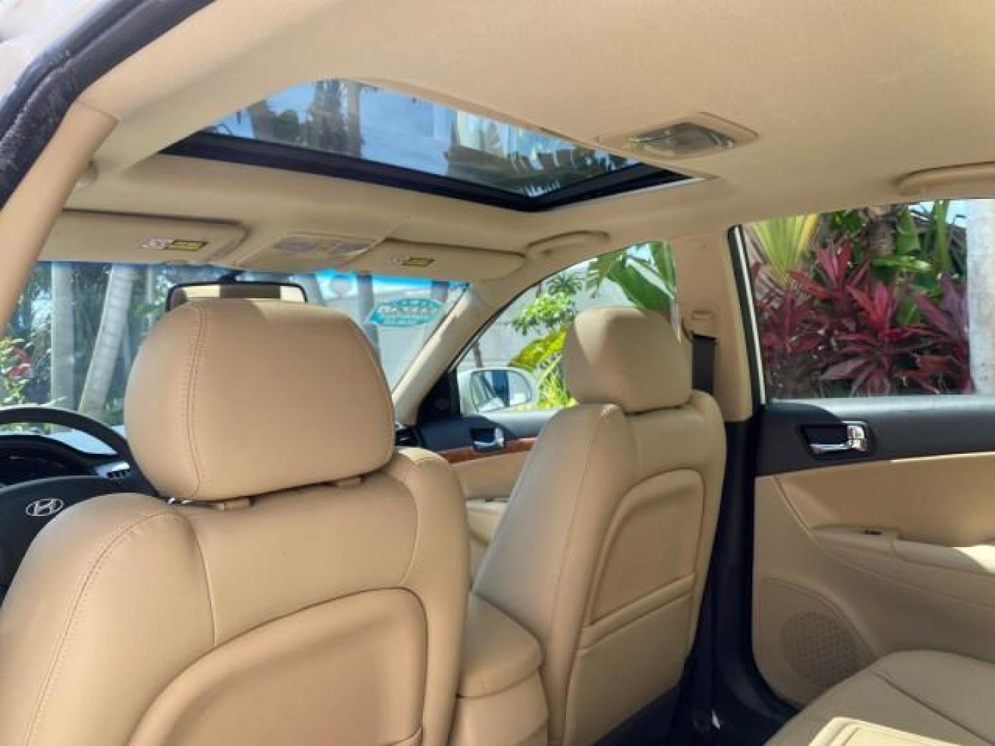 2009 Pearl White /Camel Hyundai Sonata SUNROOF Limited LOW MILES 45,849 (5NPEU46F69H) with an 3.3L DOHC V6 Engine engine, Automatic transmission, located at 4701 North Dixie Hwy, Pompano Beach, FL, 33064, (954) 422-2889, 26.240938, -80.123474 - OUR WEBPAGE FLORIDACARS1.COM HAS OVER 100 PHOTOS AND FREE CARFAX LINK 2009 Hyundai Sonata Limited V6 Sedan 4 DR 3.3L V6 F DOHC 24V Gasoline 19 MPG Front Wheel Drive Features ABS Brakes Air Conditioning Alloy Wheels AM/FM Stereo Automatic Transmission Auxiliary Audio Input CD Audio Cruise Control Fro- Photo#83