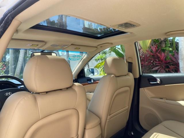 2009 Pearl White /Camel Hyundai Sonata SUNROOF Limited LOW MILES 45,849 (5NPEU46F69H) with an 3.3L DOHC V6 Engine engine, Automatic transmission, located at 4701 North Dixie Hwy, Pompano Beach, FL, 33064, (954) 422-2889, 26.240938, -80.123474 - OUR WEBPAGE FLORIDACARS1.COM HAS OVER 100 PHOTOS AND FREE CARFAX LINK 2009 Hyundai Sonata Limited V6 Sedan 4 DR 3.3L V6 F DOHC 24V Gasoline 19 MPG Front Wheel Drive Features ABS Brakes Air Conditioning Alloy Wheels AM/FM Stereo Automatic Transmission Auxiliary Audio Input CD Audio Cruise Control Fro - Photo#83