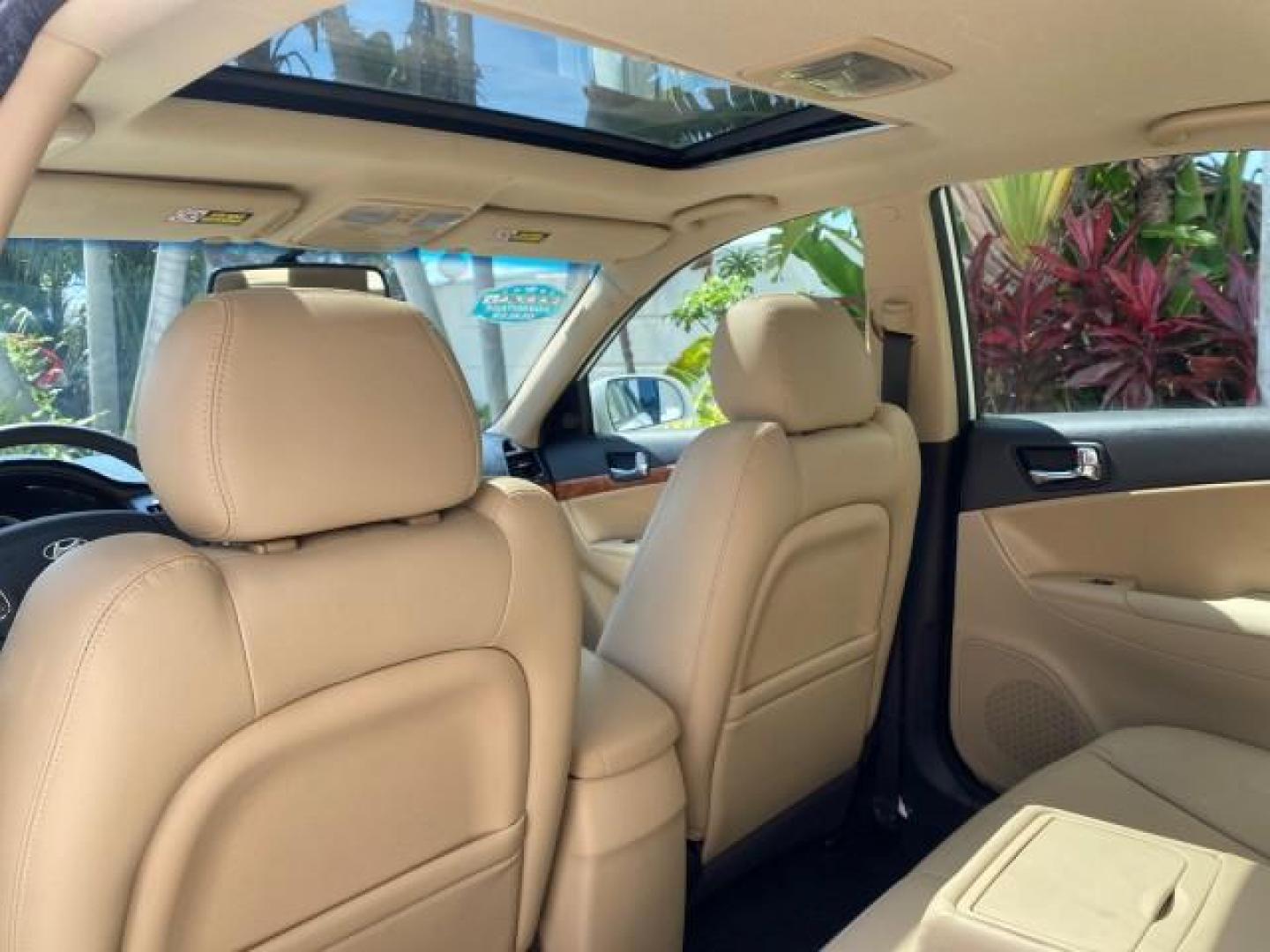 2009 Pearl White /Camel Hyundai Sonata SUNROOF Limited LOW MILES 45,849 (5NPEU46F69H) with an 3.3L DOHC V6 Engine engine, Automatic transmission, located at 4701 North Dixie Hwy, Pompano Beach, FL, 33064, (954) 422-2889, 26.240938, -80.123474 - OUR WEBPAGE FLORIDACARS1.COM HAS OVER 100 PHOTOS AND FREE CARFAX LINK 2009 Hyundai Sonata Limited V6 Sedan 4 DR 3.3L V6 F DOHC 24V Gasoline 19 MPG Front Wheel Drive Features ABS Brakes Air Conditioning Alloy Wheels AM/FM Stereo Automatic Transmission Auxiliary Audio Input CD Audio Cruise Control Fro- Photo#84