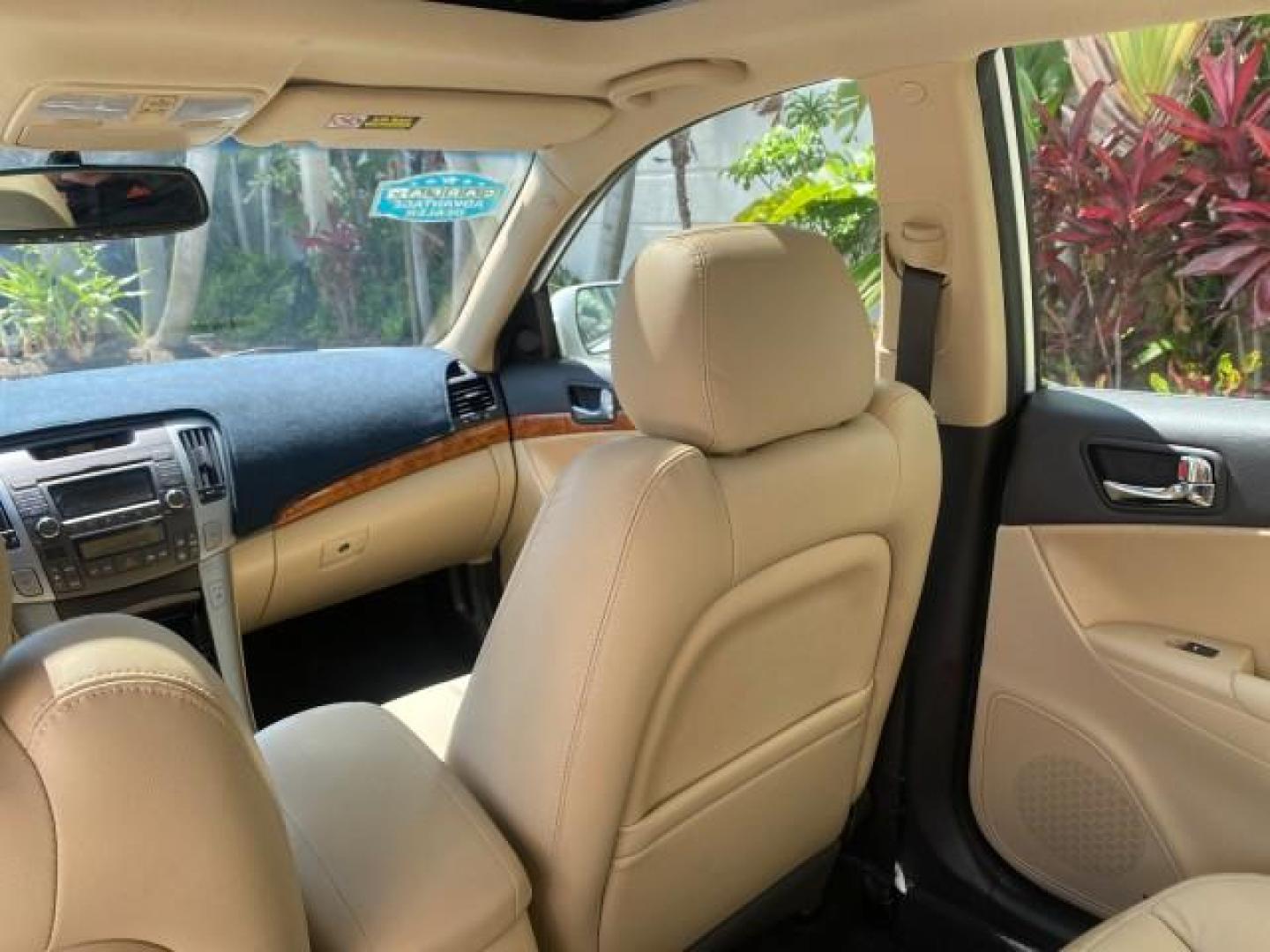 2009 Pearl White /Camel Hyundai Sonata SUNROOF Limited LOW MILES 45,849 (5NPEU46F69H) with an 3.3L DOHC V6 Engine engine, Automatic transmission, located at 4701 North Dixie Hwy, Pompano Beach, FL, 33064, (954) 422-2889, 26.240938, -80.123474 - OUR WEBPAGE FLORIDACARS1.COM HAS OVER 100 PHOTOS AND FREE CARFAX LINK 2009 Hyundai Sonata Limited V6 Sedan 4 DR 3.3L V6 F DOHC 24V Gasoline 19 MPG Front Wheel Drive Features ABS Brakes Air Conditioning Alloy Wheels AM/FM Stereo Automatic Transmission Auxiliary Audio Input CD Audio Cruise Control Fro- Photo#88