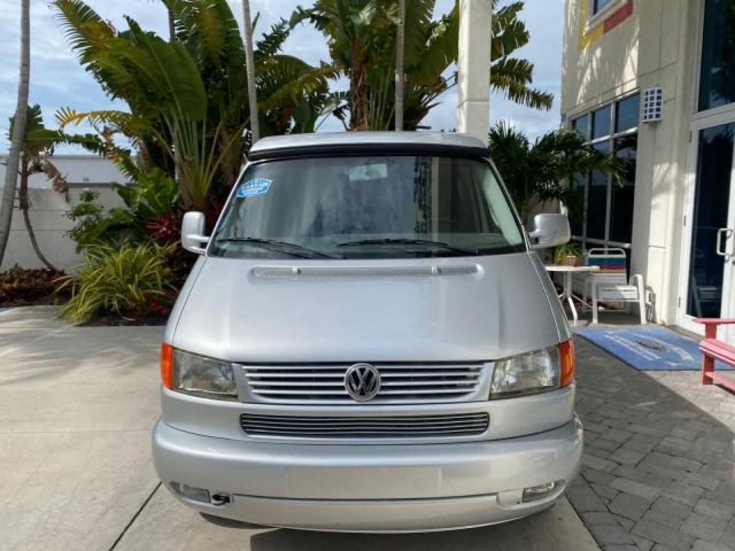 2003 Reflex Silver /Gray Volkswagen EuroVan MV POP UP CAMPER VAN (WV2NB47093H) with an 2.8L DOHC SMPI V6 Engine engine, Automatic transmission, located at 4701 North Dixie Hwy, Pompano Beach, FL, 33064, (954) 422-2889, 26.240938, -80.123474 - OUR WEBPAGE FLORIDACARS1.COM HAS OVER 100 PHOTOS AND FREE CARFAX LINK 2003 Volkswagen Eurovan MV Westfalia Pop Top Camper Van 2.8L I6 F Gasoline 20 MPG Front Wheel Drive Features ABS Brakes Air Conditioning Alloy Wheels AM/FM Stereo Automatic Transmission Cloth Seats Cruise Control Power Locks Power- Photo#2