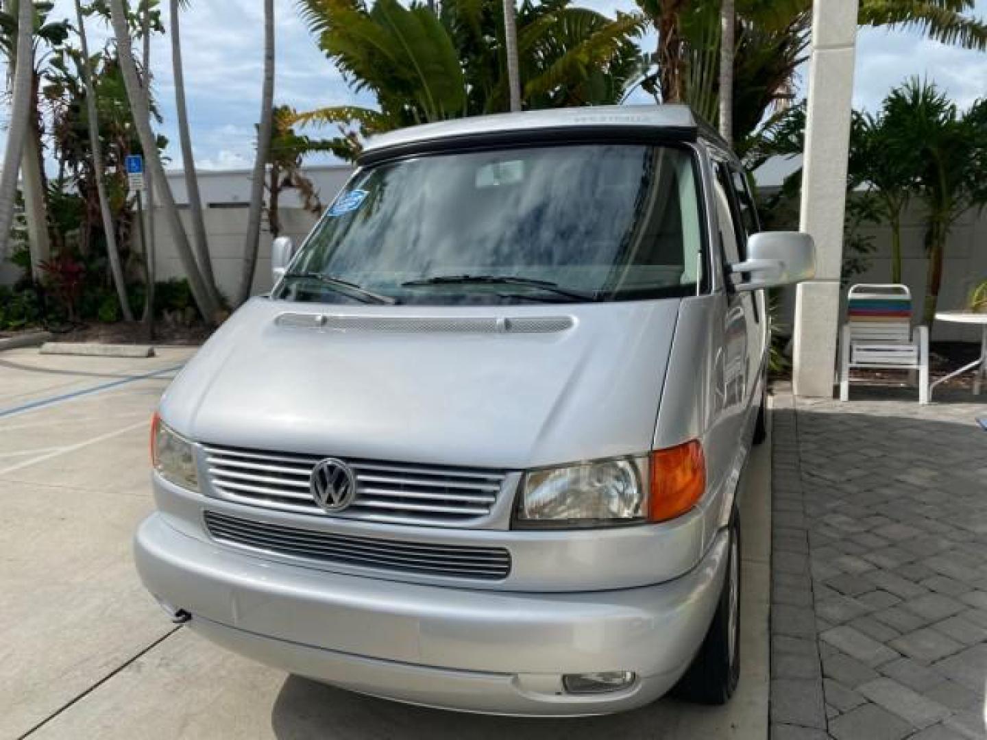 2003 Reflex Silver /Gray Volkswagen EuroVan MV POP UP CAMPER VAN (WV2NB47093H) with an 2.8L DOHC SMPI V6 Engine engine, Automatic transmission, located at 4701 North Dixie Hwy, Pompano Beach, FL, 33064, (954) 422-2889, 26.240938, -80.123474 - OUR WEBPAGE FLORIDACARS1.COM HAS OVER 100 PHOTOS AND FREE CARFAX LINK 2003 Volkswagen Eurovan MV Westfalia Pop Top Camper Van 2.8L I6 F Gasoline 20 MPG Front Wheel Drive Features ABS Brakes Air Conditioning Alloy Wheels AM/FM Stereo Automatic Transmission Cloth Seats Cruise Control Power Locks Power- Photo#3
