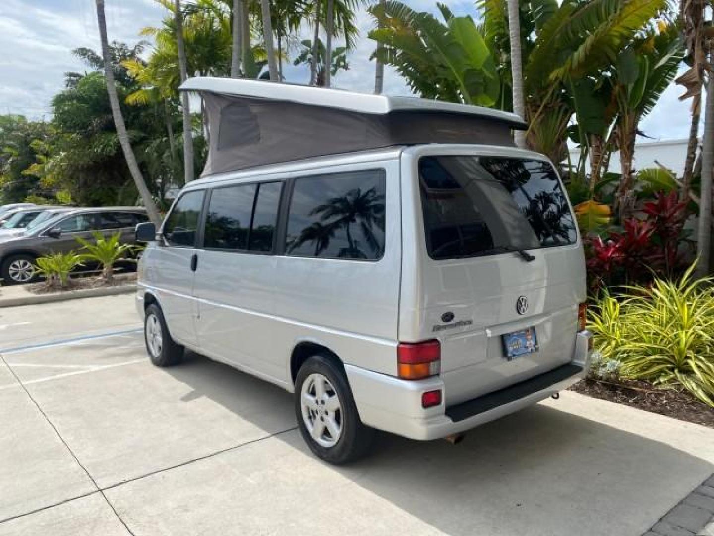 2003 Reflex Silver /Gray Volkswagen EuroVan MV POP UP CAMPER VAN (WV2NB47093H) with an 2.8L DOHC SMPI V6 Engine engine, Automatic transmission, located at 4701 North Dixie Hwy, Pompano Beach, FL, 33064, (954) 422-2889, 26.240938, -80.123474 - OUR WEBPAGE FLORIDACARS1.COM HAS OVER 100 PHOTOS AND FREE CARFAX LINK 2003 Volkswagen Eurovan MV Westfalia Pop Top Camper Van 2.8L I6 F Gasoline 20 MPG Front Wheel Drive Features ABS Brakes Air Conditioning Alloy Wheels AM/FM Stereo Automatic Transmission Cloth Seats Cruise Control Power Locks Power- Photo#5