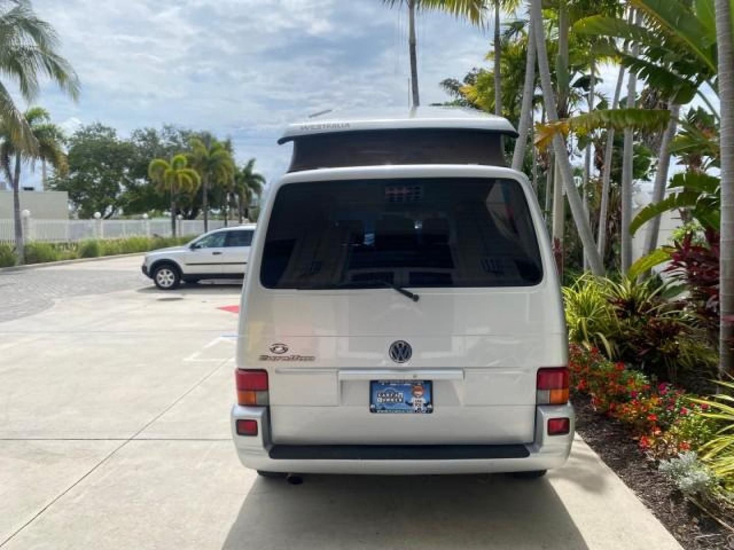 2003 Reflex Silver /Gray Volkswagen EuroVan MV POP UP CAMPER VAN (WV2NB47093H) with an 2.8L DOHC SMPI V6 Engine engine, Automatic transmission, located at 4701 North Dixie Hwy, Pompano Beach, FL, 33064, (954) 422-2889, 26.240938, -80.123474 - OUR WEBPAGE FLORIDACARS1.COM HAS OVER 100 PHOTOS AND FREE CARFAX LINK 2003 Volkswagen Eurovan MV Westfalia Pop Top Camper Van 2.8L I6 F Gasoline 20 MPG Front Wheel Drive Features ABS Brakes Air Conditioning Alloy Wheels AM/FM Stereo Automatic Transmission Cloth Seats Cruise Control Power Locks Power- Photo#6