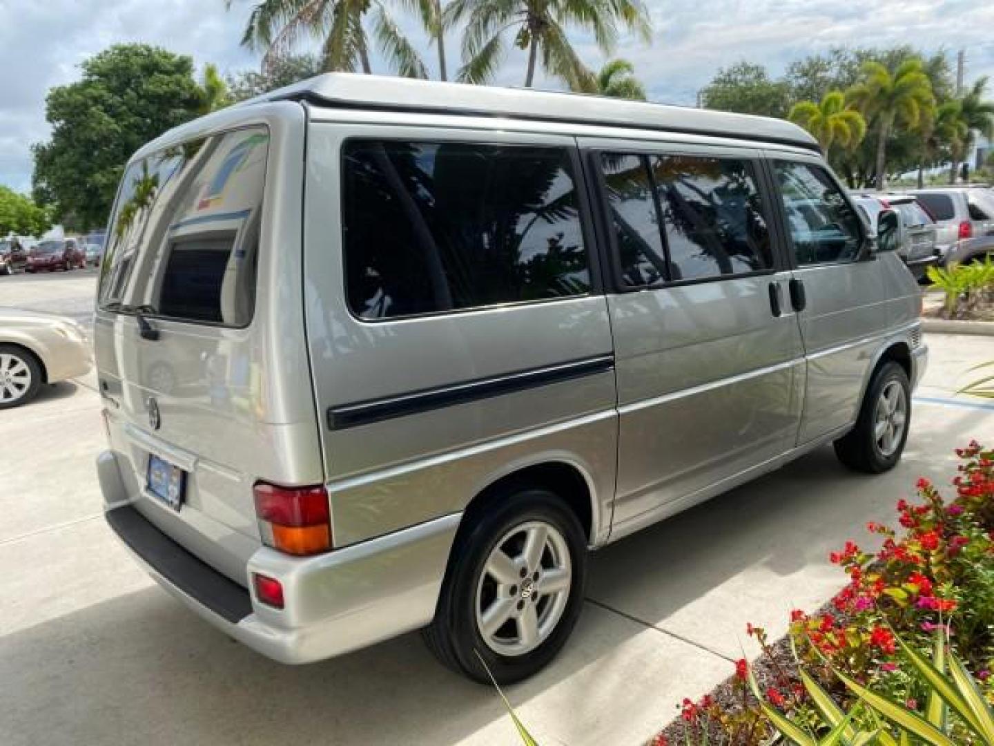 2003 Reflex Silver /Gray Volkswagen EuroVan MV POP UP CAMPER VAN (WV2NB47093H) with an 2.8L DOHC SMPI V6 Engine engine, Automatic transmission, located at 4701 North Dixie Hwy, Pompano Beach, FL, 33064, (954) 422-2889, 26.240938, -80.123474 - OUR WEBPAGE FLORIDACARS1.COM HAS OVER 100 PHOTOS AND FREE CARFAX LINK 2003 Volkswagen Eurovan MV Westfalia Pop Top Camper Van 2.8L I6 F Gasoline 20 MPG Front Wheel Drive Features ABS Brakes Air Conditioning Alloy Wheels AM/FM Stereo Automatic Transmission Cloth Seats Cruise Control Power Locks Power- Photo#7