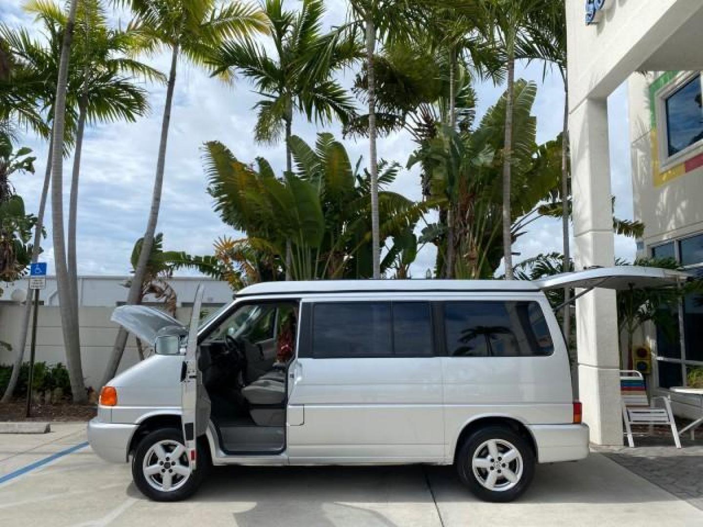 2003 Reflex Silver /Gray Volkswagen EuroVan MV POP UP CAMPER VAN (WV2NB47093H) with an 2.8L DOHC SMPI V6 Engine engine, Automatic transmission, located at 4701 North Dixie Hwy, Pompano Beach, FL, 33064, (954) 422-2889, 26.240938, -80.123474 - OUR WEBPAGE FLORIDACARS1.COM HAS OVER 100 PHOTOS AND FREE CARFAX LINK 2003 Volkswagen Eurovan MV Westfalia Pop Top Camper Van 2.8L I6 F Gasoline 20 MPG Front Wheel Drive Features ABS Brakes Air Conditioning Alloy Wheels AM/FM Stereo Automatic Transmission Cloth Seats Cruise Control Power Locks Power- Photo#8