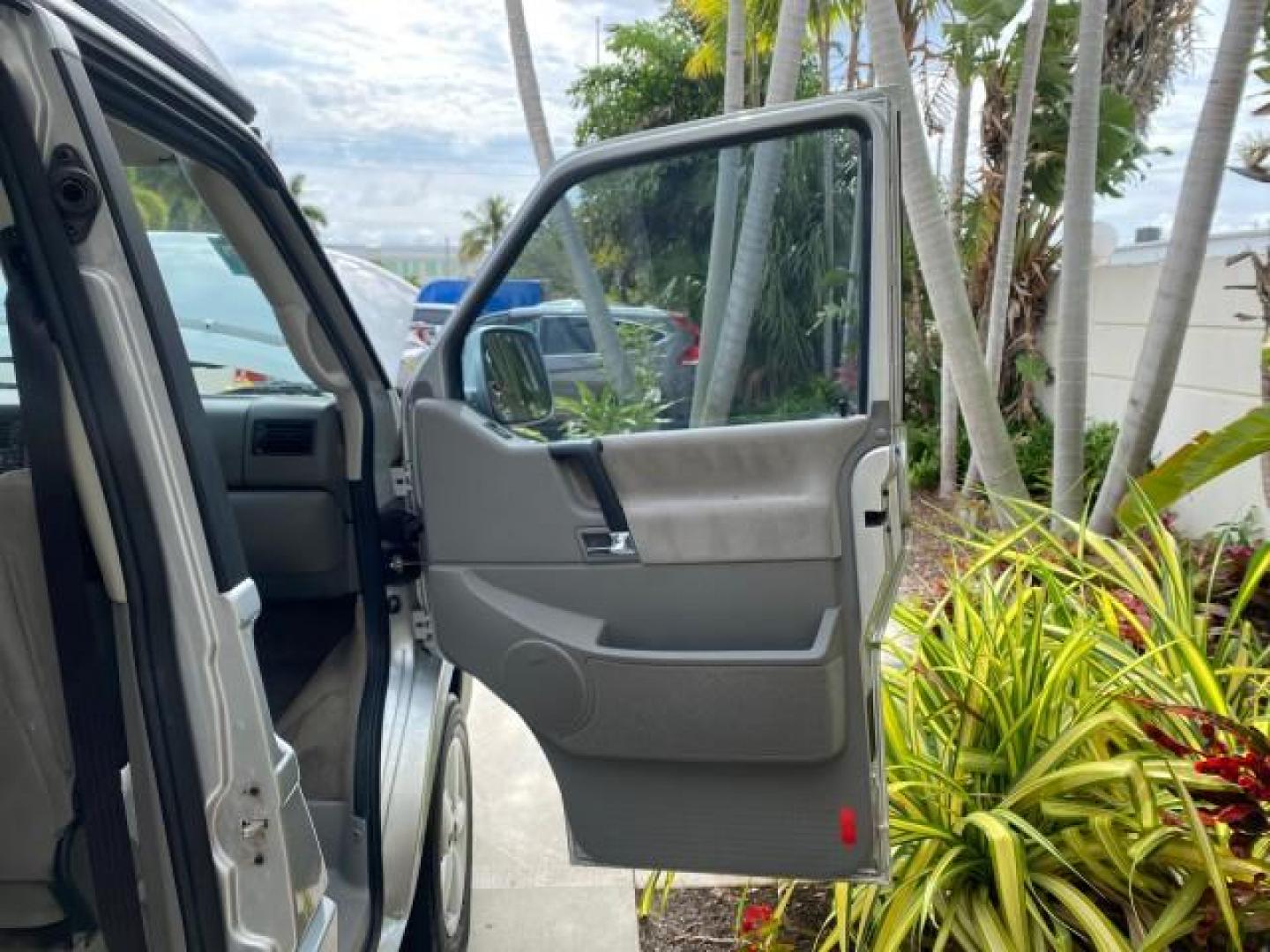 2003 Reflex Silver /Gray Volkswagen EuroVan MV POP UP CAMPER VAN (WV2NB47093H) with an 2.8L DOHC SMPI V6 Engine engine, Automatic transmission, located at 4701 North Dixie Hwy, Pompano Beach, FL, 33064, (954) 422-2889, 26.240938, -80.123474 - OUR WEBPAGE FLORIDACARS1.COM HAS OVER 100 PHOTOS AND FREE CARFAX LINK 2003 Volkswagen Eurovan MV Westfalia Pop Top Camper Van 2.8L I6 F Gasoline 20 MPG Front Wheel Drive Features ABS Brakes Air Conditioning Alloy Wheels AM/FM Stereo Automatic Transmission Cloth Seats Cruise Control Power Locks Power- Photo#11