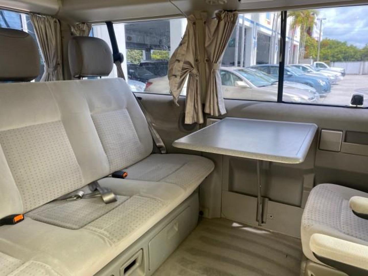 2003 Reflex Silver /Gray Volkswagen EuroVan MV POP UP CAMPER VAN (WV2NB47093H) with an 2.8L DOHC SMPI V6 Engine engine, Automatic transmission, located at 4701 North Dixie Hwy, Pompano Beach, FL, 33064, (954) 422-2889, 26.240938, -80.123474 - OUR WEBPAGE FLORIDACARS1.COM HAS OVER 100 PHOTOS AND FREE CARFAX LINK 2003 Volkswagen Eurovan MV Westfalia Pop Top Camper Van 2.8L I6 F Gasoline 20 MPG Front Wheel Drive Features ABS Brakes Air Conditioning Alloy Wheels AM/FM Stereo Automatic Transmission Cloth Seats Cruise Control Power Locks Power- Photo#13