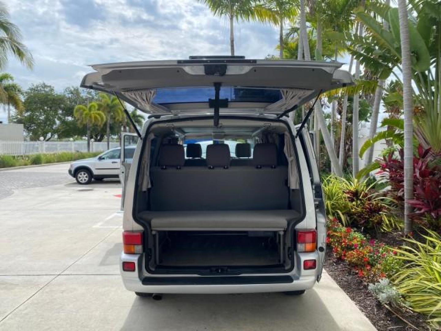 2003 Reflex Silver /Gray Volkswagen EuroVan MV POP UP CAMPER VAN (WV2NB47093H) with an 2.8L DOHC SMPI V6 Engine engine, Automatic transmission, located at 4701 North Dixie Hwy, Pompano Beach, FL, 33064, (954) 422-2889, 26.240938, -80.123474 - OUR WEBPAGE FLORIDACARS1.COM HAS OVER 100 PHOTOS AND FREE CARFAX LINK 2003 Volkswagen Eurovan MV Westfalia Pop Top Camper Van 2.8L I6 F Gasoline 20 MPG Front Wheel Drive Features ABS Brakes Air Conditioning Alloy Wheels AM/FM Stereo Automatic Transmission Cloth Seats Cruise Control Power Locks Power- Photo#15