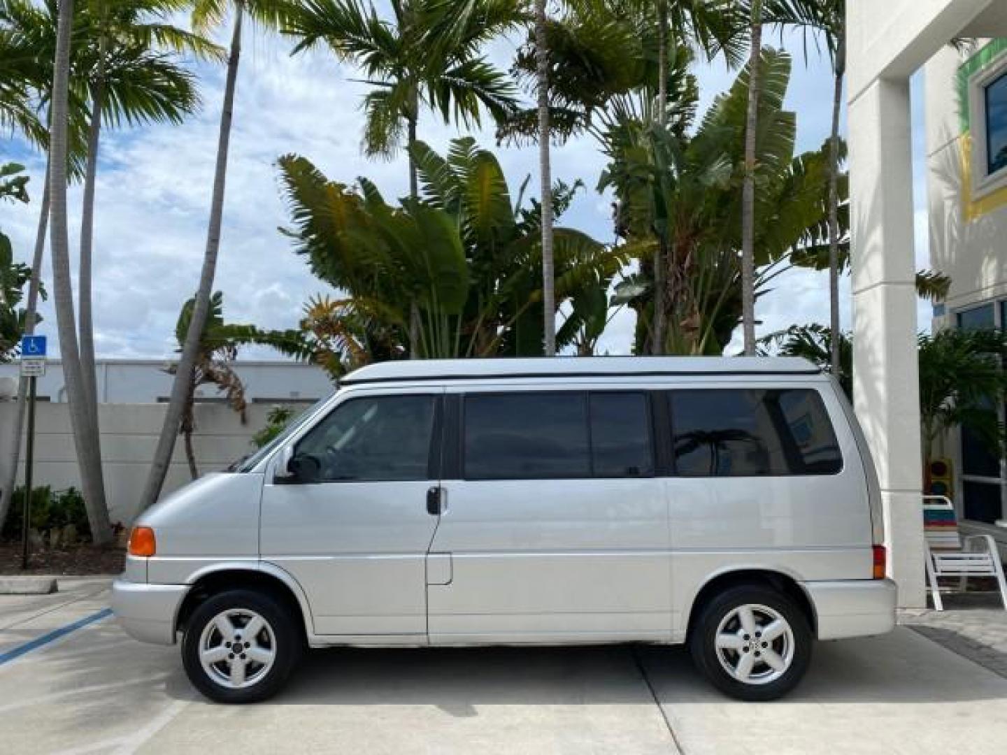 2003 Reflex Silver /Gray Volkswagen EuroVan MV POP UP CAMPER VAN (WV2NB47093H) with an 2.8L DOHC SMPI V6 Engine engine, Automatic transmission, located at 4701 North Dixie Hwy, Pompano Beach, FL, 33064, (954) 422-2889, 26.240938, -80.123474 - OUR WEBPAGE FLORIDACARS1.COM HAS OVER 100 PHOTOS AND FREE CARFAX LINK 2003 Volkswagen Eurovan MV Westfalia Pop Top Camper Van 2.8L I6 F Gasoline 20 MPG Front Wheel Drive Features ABS Brakes Air Conditioning Alloy Wheels AM/FM Stereo Automatic Transmission Cloth Seats Cruise Control Power Locks Power- Photo#30