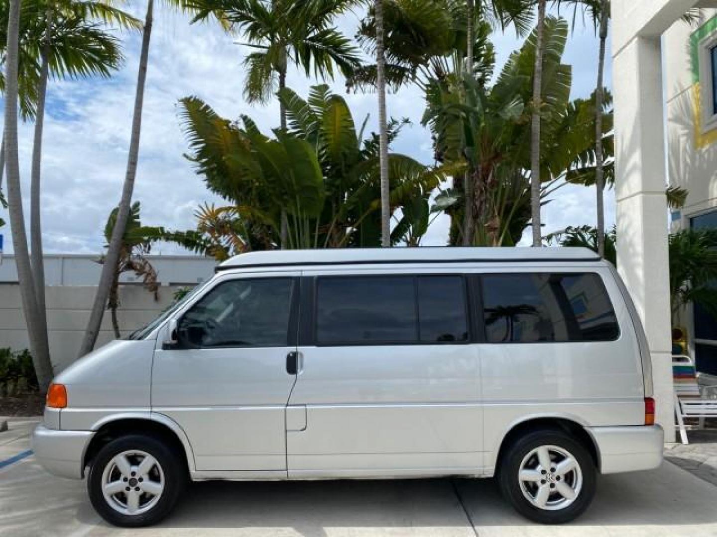 2003 Reflex Silver /Gray Volkswagen EuroVan MV POP UP CAMPER VAN (WV2NB47093H) with an 2.8L DOHC SMPI V6 Engine engine, Automatic transmission, located at 4701 North Dixie Hwy, Pompano Beach, FL, 33064, (954) 422-2889, 26.240938, -80.123474 - OUR WEBPAGE FLORIDACARS1.COM HAS OVER 100 PHOTOS AND FREE CARFAX LINK 2003 Volkswagen Eurovan MV Westfalia Pop Top Camper Van 2.8L I6 F Gasoline 20 MPG Front Wheel Drive Features ABS Brakes Air Conditioning Alloy Wheels AM/FM Stereo Automatic Transmission Cloth Seats Cruise Control Power Locks Power- Photo#31