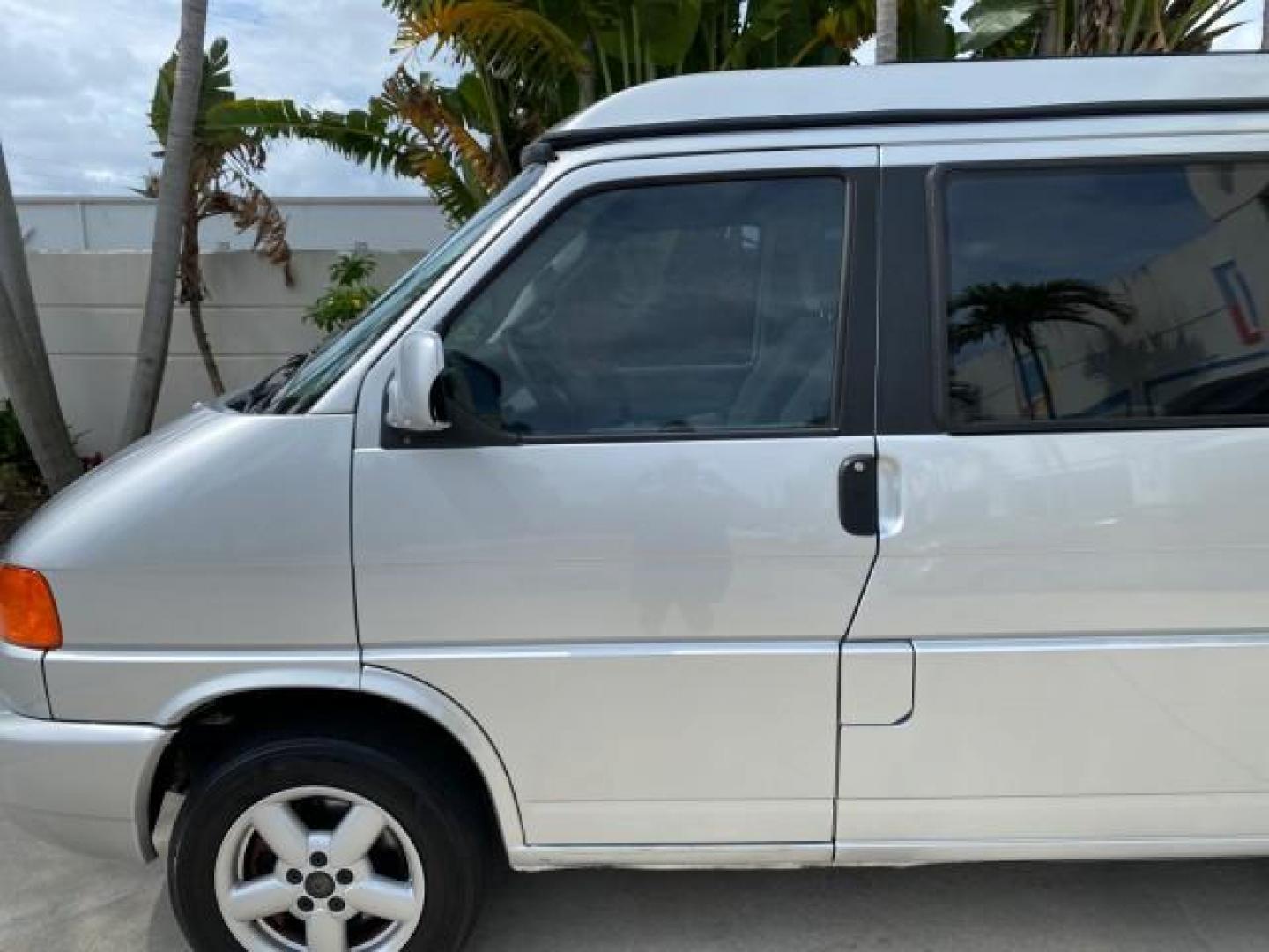 2003 Reflex Silver /Gray Volkswagen EuroVan MV POP UP CAMPER VAN (WV2NB47093H) with an 2.8L DOHC SMPI V6 Engine engine, Automatic transmission, located at 4701 North Dixie Hwy, Pompano Beach, FL, 33064, (954) 422-2889, 26.240938, -80.123474 - OUR WEBPAGE FLORIDACARS1.COM HAS OVER 100 PHOTOS AND FREE CARFAX LINK 2003 Volkswagen Eurovan MV Westfalia Pop Top Camper Van 2.8L I6 F Gasoline 20 MPG Front Wheel Drive Features ABS Brakes Air Conditioning Alloy Wheels AM/FM Stereo Automatic Transmission Cloth Seats Cruise Control Power Locks Power- Photo#36
