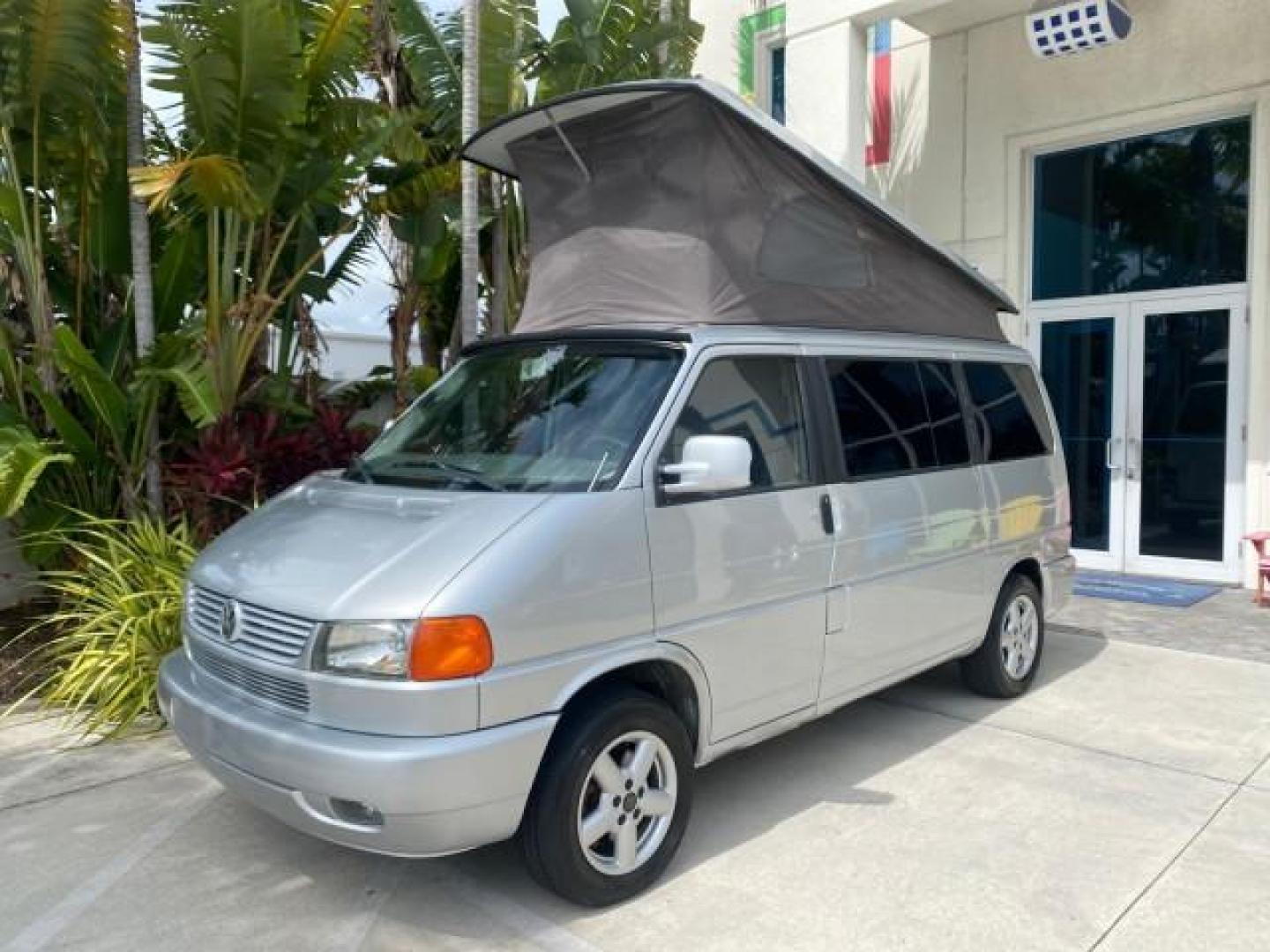 2003 Reflex Silver /Gray Volkswagen EuroVan MV POP UP CAMPER VAN (WV2NB47093H) with an 2.8L DOHC SMPI V6 Engine engine, Automatic transmission, located at 4701 North Dixie Hwy, Pompano Beach, FL, 33064, (954) 422-2889, 26.240938, -80.123474 - OUR WEBPAGE FLORIDACARS1.COM HAS OVER 100 PHOTOS AND FREE CARFAX LINK 2003 Volkswagen Eurovan MV Westfalia Pop Top Camper Van 2.8L I6 F Gasoline 20 MPG Front Wheel Drive Features ABS Brakes Air Conditioning Alloy Wheels AM/FM Stereo Automatic Transmission Cloth Seats Cruise Control Power Locks Power- Photo#69