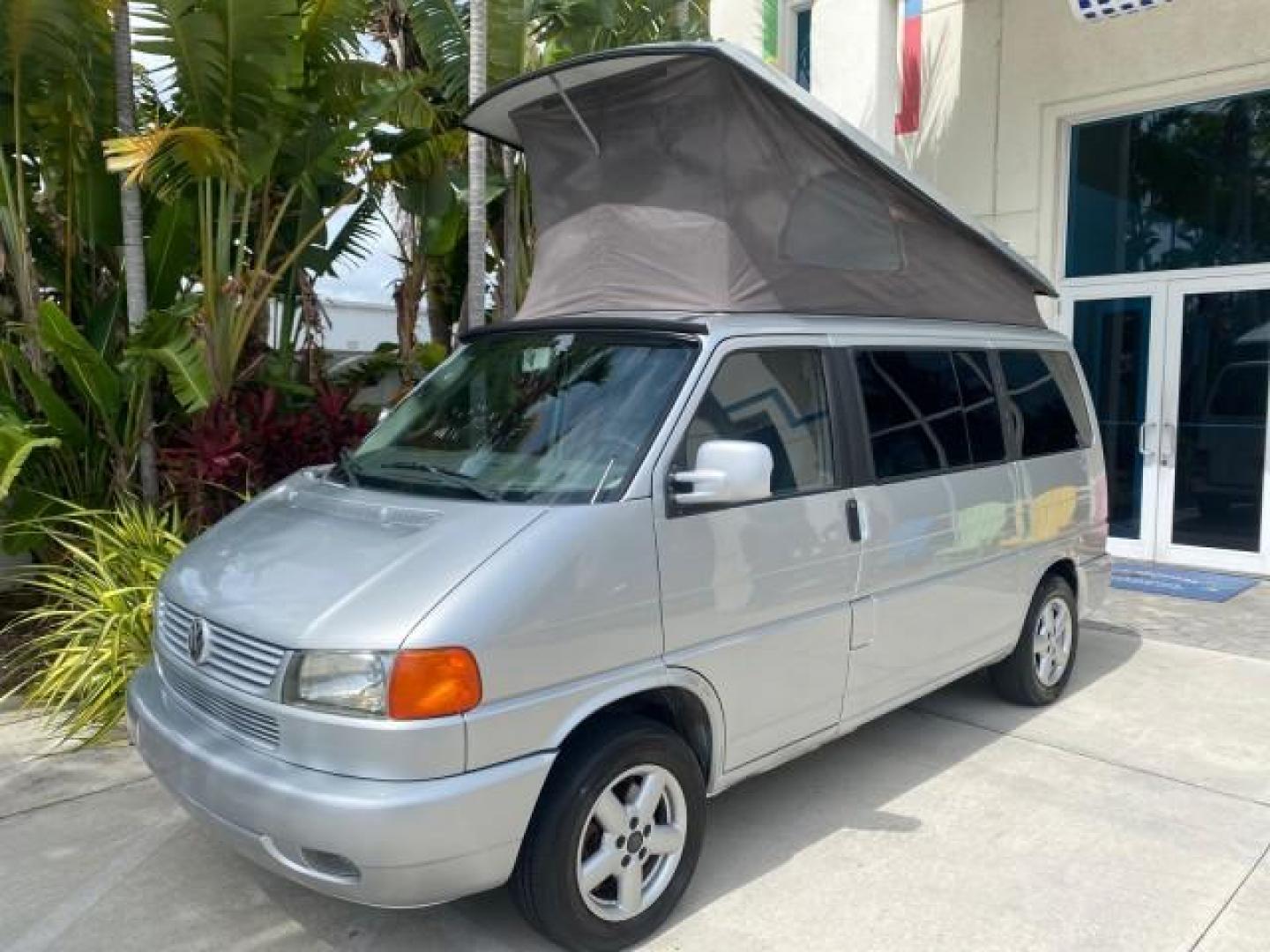 2003 Reflex Silver /Gray Volkswagen EuroVan MV POP UP CAMPER VAN (WV2NB47093H) with an 2.8L DOHC SMPI V6 Engine engine, Automatic transmission, located at 4701 North Dixie Hwy, Pompano Beach, FL, 33064, (954) 422-2889, 26.240938, -80.123474 - OUR WEBPAGE FLORIDACARS1.COM HAS OVER 100 PHOTOS AND FREE CARFAX LINK 2003 Volkswagen Eurovan MV Westfalia Pop Top Camper Van 2.8L I6 F Gasoline 20 MPG Front Wheel Drive Features ABS Brakes Air Conditioning Alloy Wheels AM/FM Stereo Automatic Transmission Cloth Seats Cruise Control Power Locks Power- Photo#70