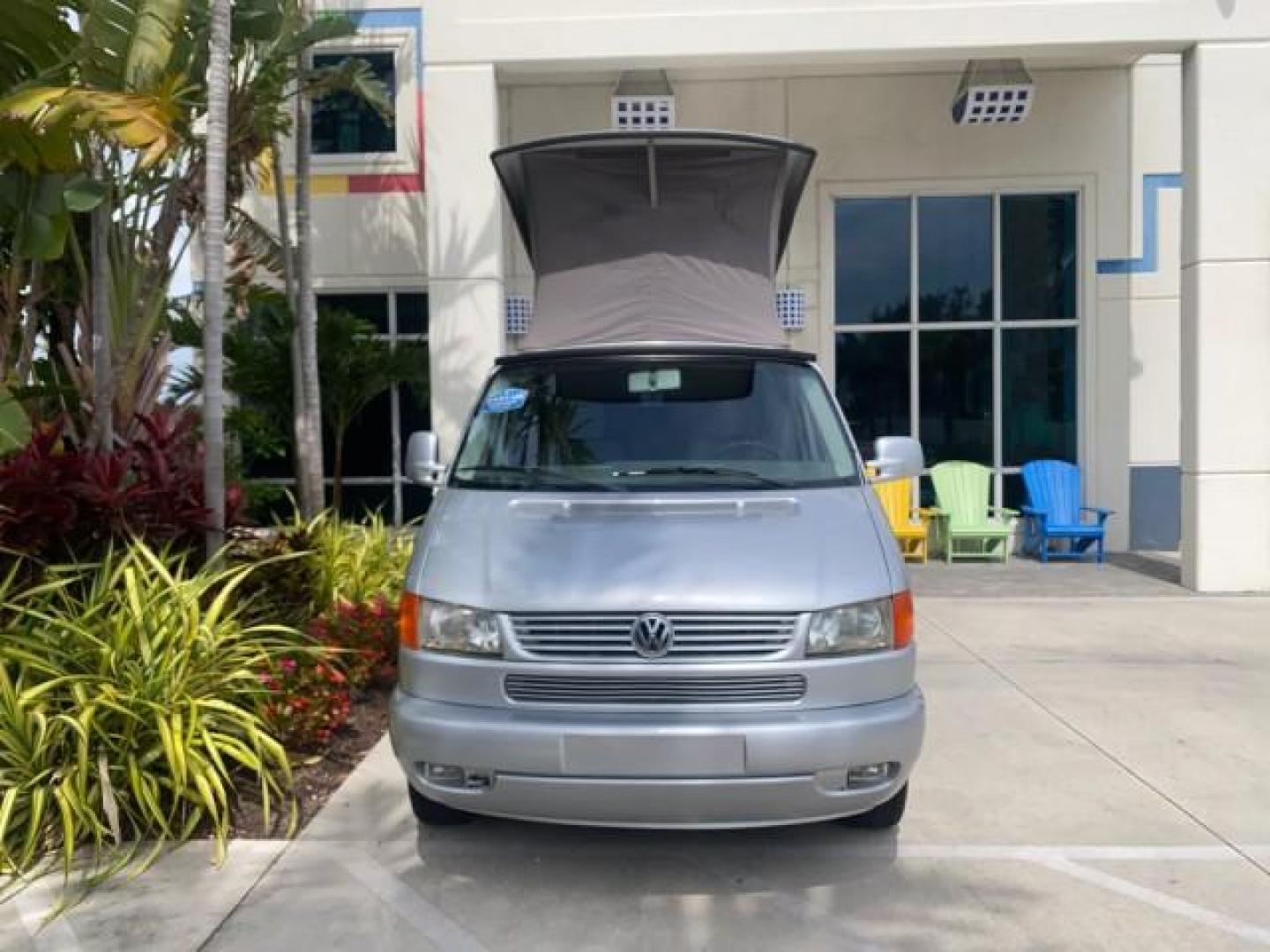 2003 Reflex Silver /Gray Volkswagen EuroVan MV POP UP CAMPER VAN (WV2NB47093H) with an 2.8L DOHC SMPI V6 Engine engine, Automatic transmission, located at 4701 North Dixie Hwy, Pompano Beach, FL, 33064, (954) 422-2889, 26.240938, -80.123474 - OUR WEBPAGE FLORIDACARS1.COM HAS OVER 100 PHOTOS AND FREE CARFAX LINK 2003 Volkswagen Eurovan MV Westfalia Pop Top Camper Van 2.8L I6 F Gasoline 20 MPG Front Wheel Drive Features ABS Brakes Air Conditioning Alloy Wheels AM/FM Stereo Automatic Transmission Cloth Seats Cruise Control Power Locks Power- Photo#71