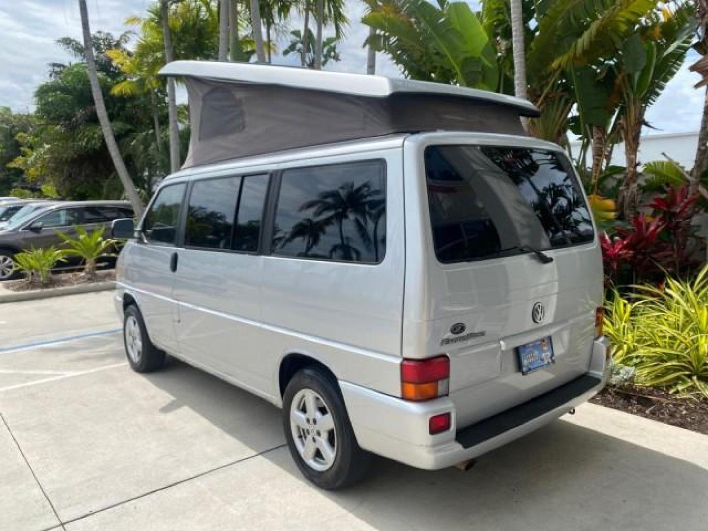 2003 Reflex Silver /Gray Volkswagen EuroVan MV POP UP CAMPER VAN (WV2NB47093H) with an 2.8L DOHC SMPI V6 Engine engine, Automatic transmission, located at 4701 North Dixie Hwy, Pompano Beach, FL, 33064, (954) 422-2889, 26.240938, -80.123474 - OUR WEBPAGE FLORIDACARS1.COM HAS OVER 100 PHOTOS AND FREE CARFAX LINK 2003 Volkswagen Eurovan MV Westfalia Pop Top Camper Van 2.8L I6 F Gasoline 20 MPG Front Wheel Drive Features ABS Brakes Air Conditioning Alloy Wheels AM/FM Stereo Automatic Transmission Cloth Seats Cruise Control Power Locks Power- Photo#73