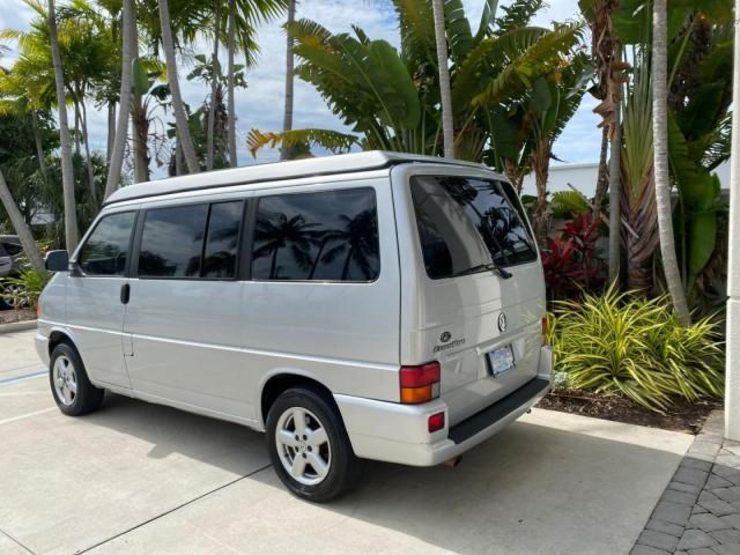 2003 Reflex Silver /Gray Volkswagen EuroVan MV POP UP CAMPER VAN (WV2NB47093H) with an 2.8L DOHC SMPI V6 Engine engine, Automatic transmission, located at 4701 North Dixie Hwy, Pompano Beach, FL, 33064, (954) 422-2889, 26.240938, -80.123474 - OUR WEBPAGE FLORIDACARS1.COM HAS OVER 100 PHOTOS AND FREE CARFAX LINK 2003 Volkswagen Eurovan MV Westfalia Pop Top Camper Van 2.8L I6 F Gasoline 20 MPG Front Wheel Drive Features ABS Brakes Air Conditioning Alloy Wheels AM/FM Stereo Automatic Transmission Cloth Seats Cruise Control Power Locks Power- Photo#74