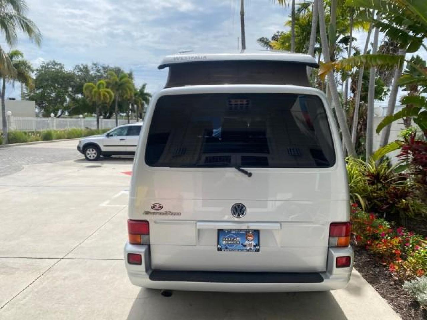 2003 Reflex Silver /Gray Volkswagen EuroVan MV POP UP CAMPER VAN (WV2NB47093H) with an 2.8L DOHC SMPI V6 Engine engine, Automatic transmission, located at 4701 North Dixie Hwy, Pompano Beach, FL, 33064, (954) 422-2889, 26.240938, -80.123474 - OUR WEBPAGE FLORIDACARS1.COM HAS OVER 100 PHOTOS AND FREE CARFAX LINK 2003 Volkswagen Eurovan MV Westfalia Pop Top Camper Van 2.8L I6 F Gasoline 20 MPG Front Wheel Drive Features ABS Brakes Air Conditioning Alloy Wheels AM/FM Stereo Automatic Transmission Cloth Seats Cruise Control Power Locks Power- Photo#75
