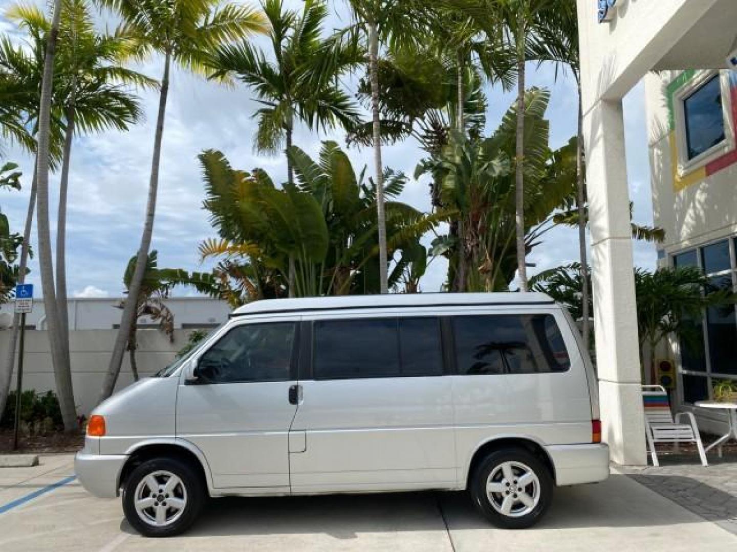 2003 Reflex Silver /Gray Volkswagen EuroVan MV POP UP CAMPER VAN (WV2NB47093H) with an 2.8L DOHC SMPI V6 Engine engine, Automatic transmission, located at 4701 North Dixie Hwy, Pompano Beach, FL, 33064, (954) 422-2889, 26.240938, -80.123474 - OUR WEBPAGE FLORIDACARS1.COM HAS OVER 100 PHOTOS AND FREE CARFAX LINK 2003 Volkswagen Eurovan MV Westfalia Pop Top Camper Van 2.8L I6 F Gasoline 20 MPG Front Wheel Drive Features ABS Brakes Air Conditioning Alloy Wheels AM/FM Stereo Automatic Transmission Cloth Seats Cruise Control Power Locks Power- Photo#76