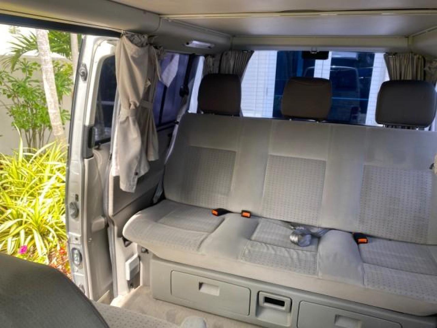 2003 Reflex Silver /Gray Volkswagen EuroVan MV POP UP CAMPER VAN (WV2NB47093H) with an 2.8L DOHC SMPI V6 Engine engine, Automatic transmission, located at 4701 North Dixie Hwy, Pompano Beach, FL, 33064, (954) 422-2889, 26.240938, -80.123474 - OUR WEBPAGE FLORIDACARS1.COM HAS OVER 100 PHOTOS AND FREE CARFAX LINK 2003 Volkswagen Eurovan MV Westfalia Pop Top Camper Van 2.8L I6 F Gasoline 20 MPG Front Wheel Drive Features ABS Brakes Air Conditioning Alloy Wheels AM/FM Stereo Automatic Transmission Cloth Seats Cruise Control Power Locks Power- Photo#78