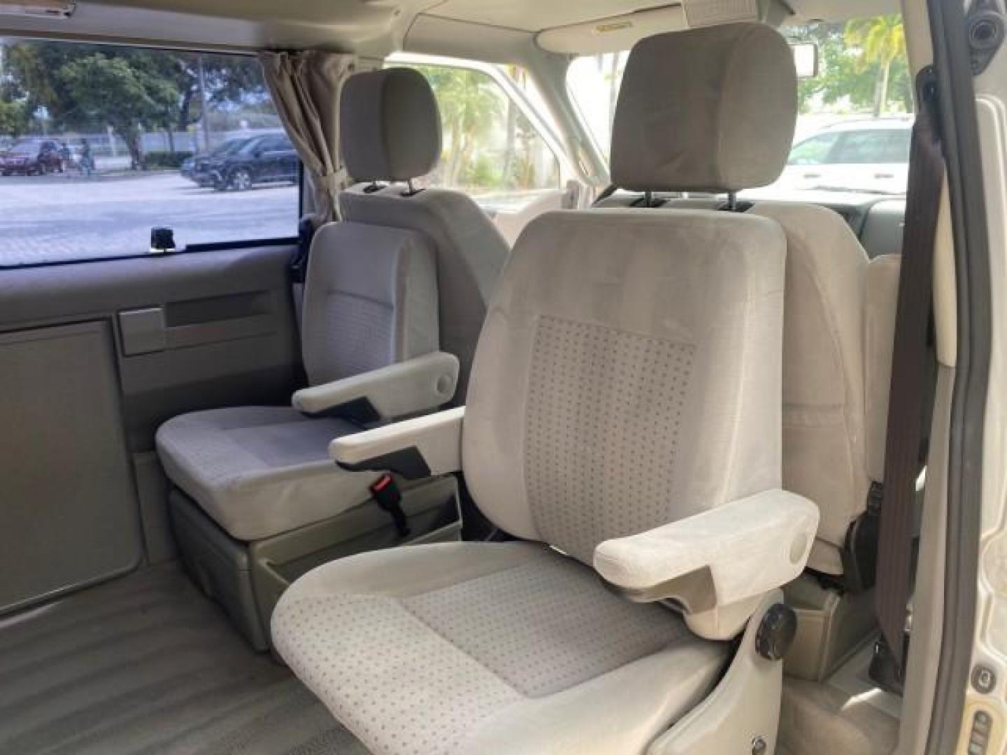 2003 Reflex Silver /Gray Volkswagen EuroVan MV POP UP CAMPER VAN (WV2NB47093H) with an 2.8L DOHC SMPI V6 Engine engine, Automatic transmission, located at 4701 North Dixie Hwy, Pompano Beach, FL, 33064, (954) 422-2889, 26.240938, -80.123474 - OUR WEBPAGE FLORIDACARS1.COM HAS OVER 100 PHOTOS AND FREE CARFAX LINK 2003 Volkswagen Eurovan MV Westfalia Pop Top Camper Van 2.8L I6 F Gasoline 20 MPG Front Wheel Drive Features ABS Brakes Air Conditioning Alloy Wheels AM/FM Stereo Automatic Transmission Cloth Seats Cruise Control Power Locks Power- Photo#83