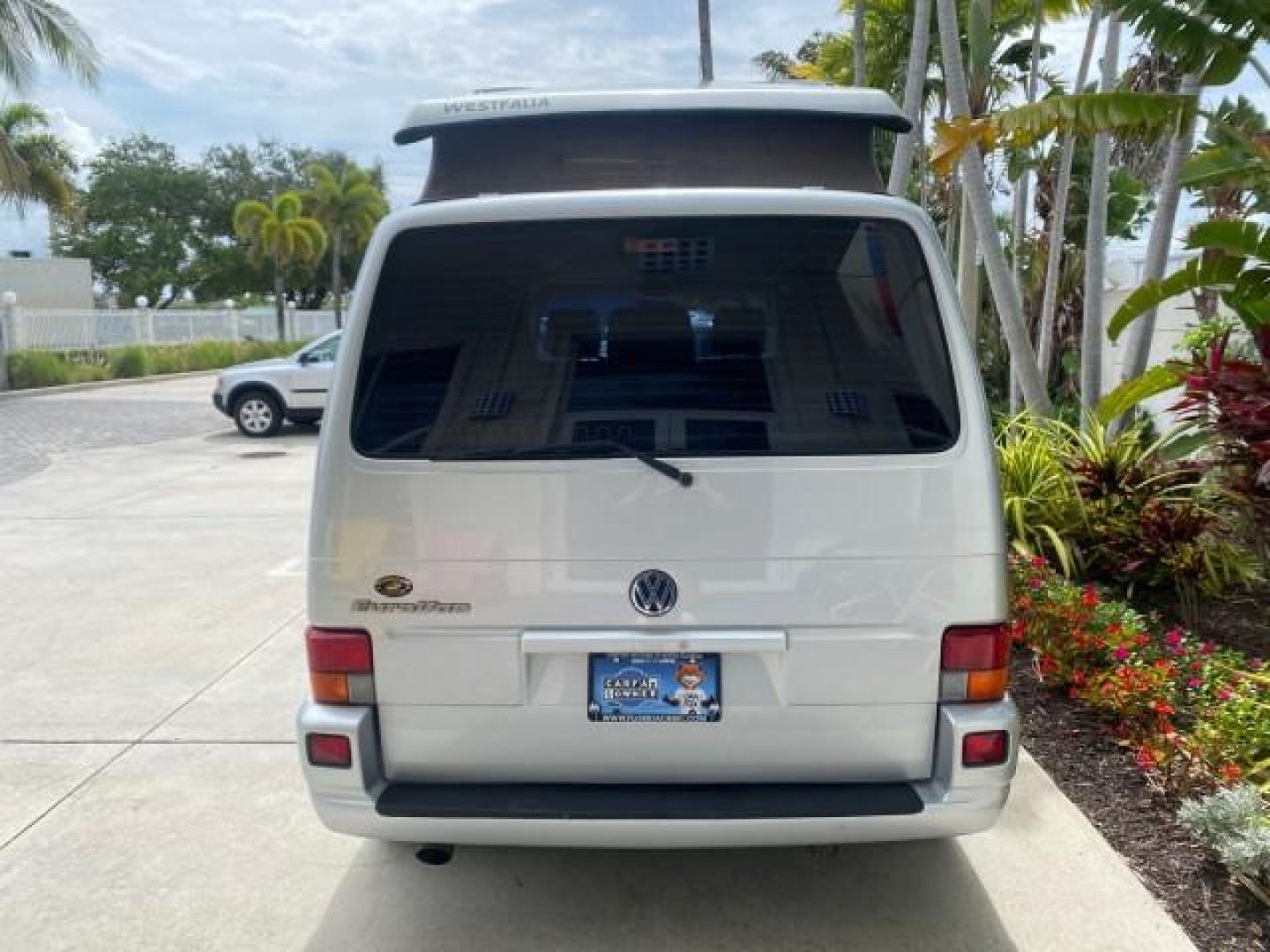 2003 Reflex Silver /Gray Volkswagen EuroVan MV POP UP CAMPER VAN (WV2NB47093H) with an 2.8L DOHC SMPI V6 Engine engine, Automatic transmission, located at 4701 North Dixie Hwy, Pompano Beach, FL, 33064, (954) 422-2889, 26.240938, -80.123474 - OUR WEBPAGE FLORIDACARS1.COM HAS OVER 100 PHOTOS AND FREE CARFAX LINK 2003 Volkswagen Eurovan MV Westfalia Pop Top Camper Van 2.8L I6 F Gasoline 20 MPG Front Wheel Drive Features ABS Brakes Air Conditioning Alloy Wheels AM/FM Stereo Automatic Transmission Cloth Seats Cruise Control Power Locks Power- Photo#97