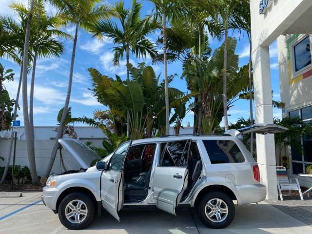 2004 Starlight Silver Metallic /Gray Honda Pilot EX-L 4WD LOW MILES 64,262 (2HKYF18574H) with an 3.5L SOHC PGM-FI 24-Valve VTEC V6 Engine engine, Automatic transmission, located at 4701 North Dixie Hwy, Pompano Beach, FL, 33064, (954) 422-2889, 26.240938, -80.123474 - OUR WEBPAGE FLORIDACARS1.COM HAS OVER 100 PHOTOS AND FREE CARFAX LINK 2004 Honda Pilot EX-L 4WD/AWD 4 Door Wagon/Sport Utility 3.5L V6 F SOHC Gasoline 22 MPG All Wheel Drive Features 4WD/AWD ABS Brakes Air Conditioning Alloy Wheels AM/FM Stereo Automatic Transmission Cassette Player CD Audio Cruise- Photo#8