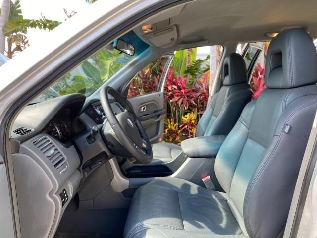 2004 Starlight Silver Metallic /Gray Honda Pilot EX-L 4WD LOW MILES 64,262 (2HKYF18574H) with an 3.5L SOHC PGM-FI 24-Valve VTEC V6 Engine engine, Automatic transmission, located at 4701 North Dixie Hwy, Pompano Beach, FL, 33064, (954) 422-2889, 26.240938, -80.123474 - OUR WEBPAGE FLORIDACARS1.COM HAS OVER 100 PHOTOS AND FREE CARFAX LINK 2004 Honda Pilot EX-L 4WD/AWD 4 Door Wagon/Sport Utility 3.5L V6 F SOHC Gasoline 22 MPG All Wheel Drive Features 4WD/AWD ABS Brakes Air Conditioning Alloy Wheels AM/FM Stereo Automatic Transmission Cassette Player CD Audio Cruise- Photo#10